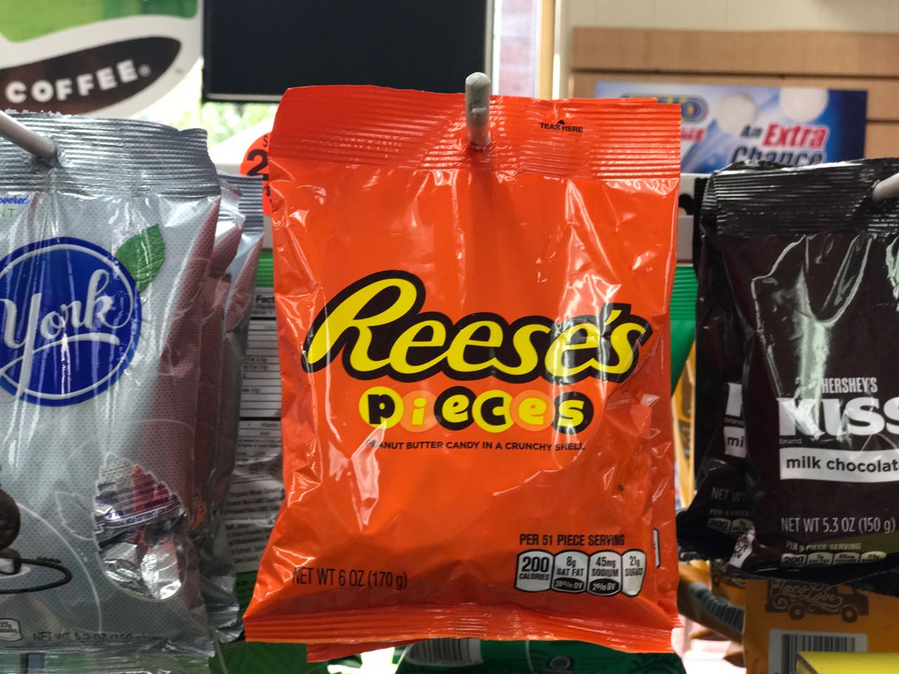 Order 6 oz. Reese's Pieces Peg Bag food online from The Ice Cream Shop store, Providence on bringmethat.com