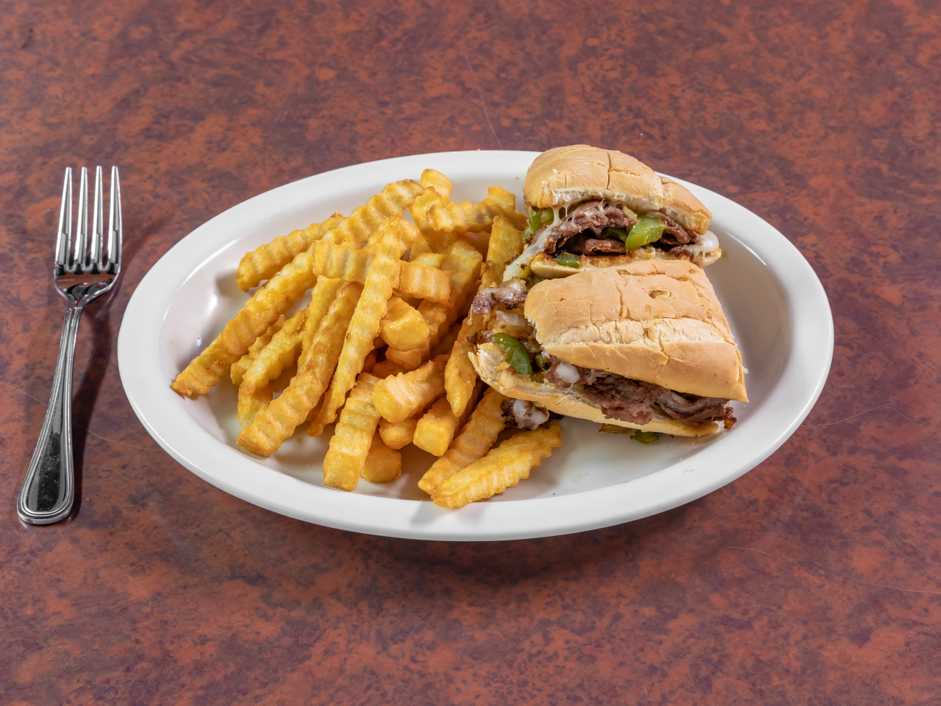 Order Philly Cheese Steak Sandwich  food online from Tailgaters Sports Grill & Il Primo Pizza & Wings store, Litchfield Park on bringmethat.com