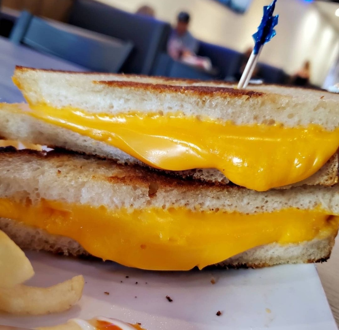 Order Grilled Cheese Sandwich with Curly Fries food online from Hot Wings Cafe store, Pasadena on bringmethat.com