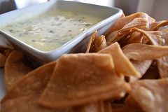 Order Queso-Blanco Dip with Tortilla Chips food online from Brass Buckle store, Conyngham on bringmethat.com