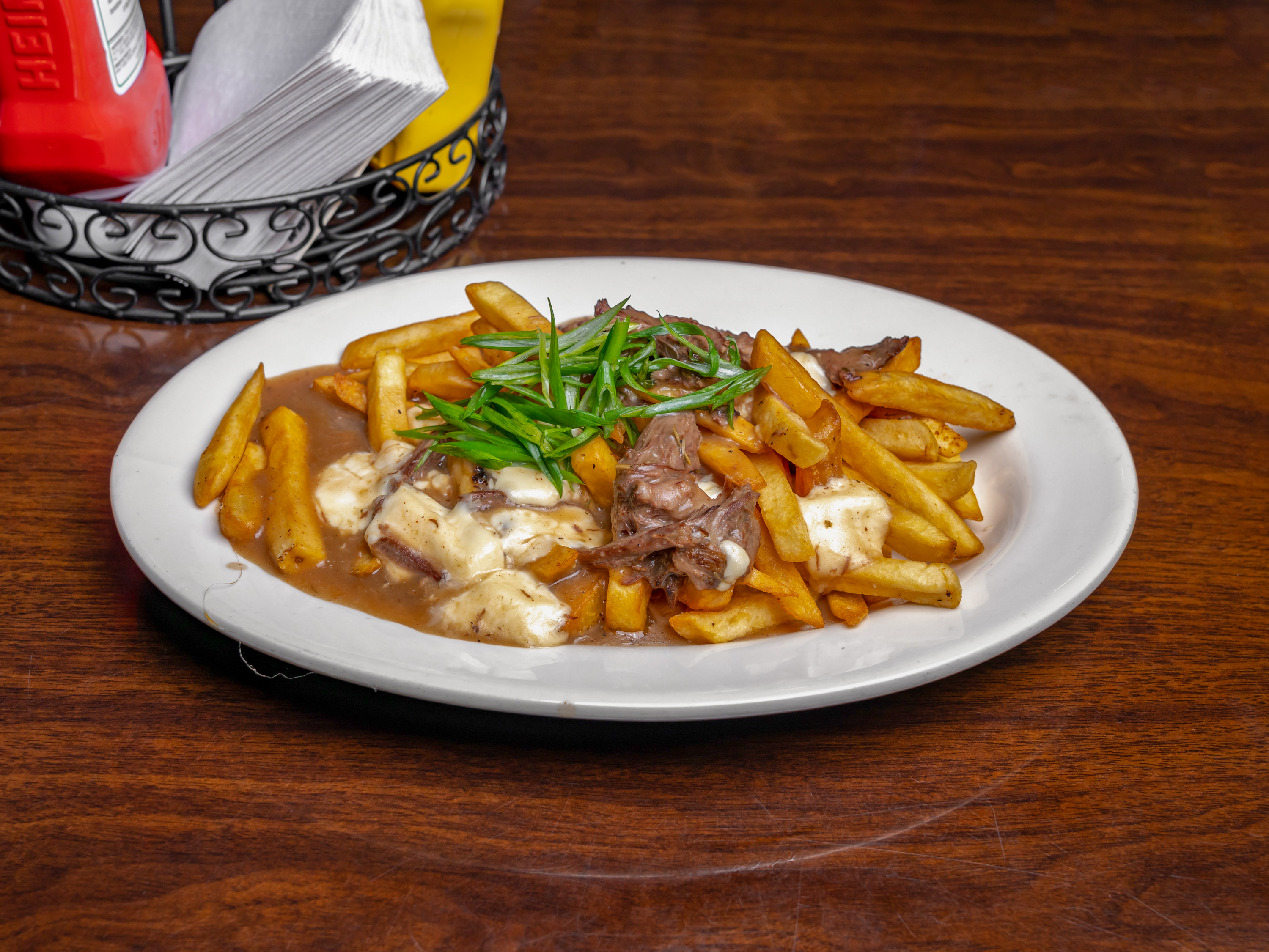 Order Poutine food online from Crossroads Tabletop Tavern store, Manassas on bringmethat.com