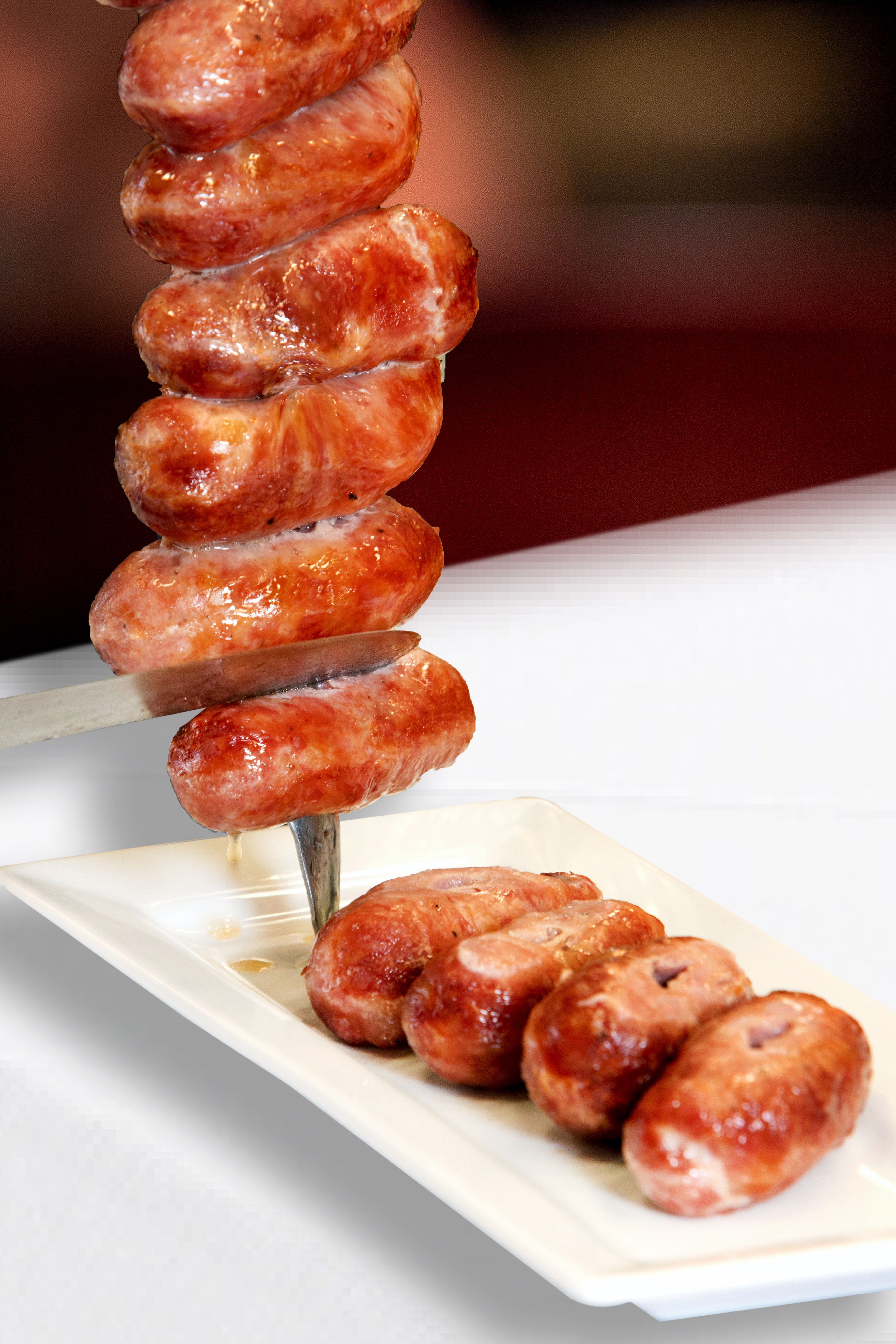Order Brazilian Pork Sausage Specialty food online from Rios Brazilian Steakhouse store, Charlotte on bringmethat.com