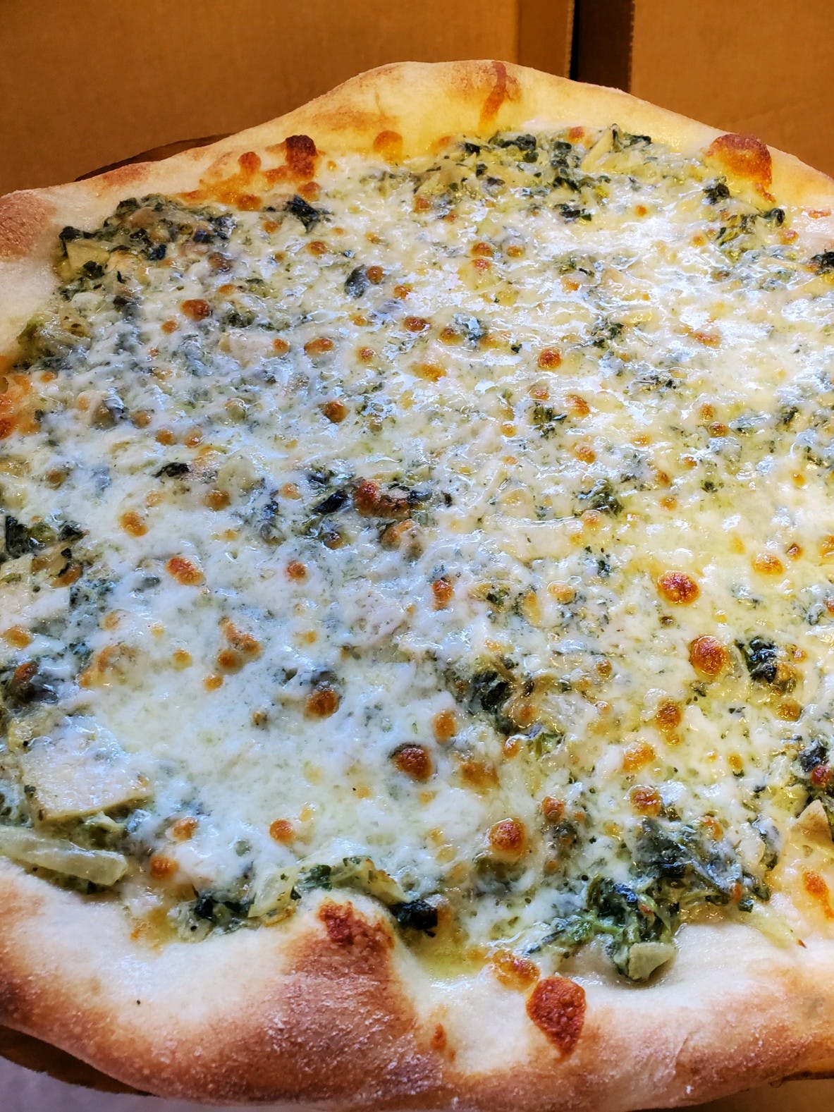 Order Spinach & Artichoke Pizza - Personal 12" food online from Gino's Of Tuscany store, Bethpage on bringmethat.com