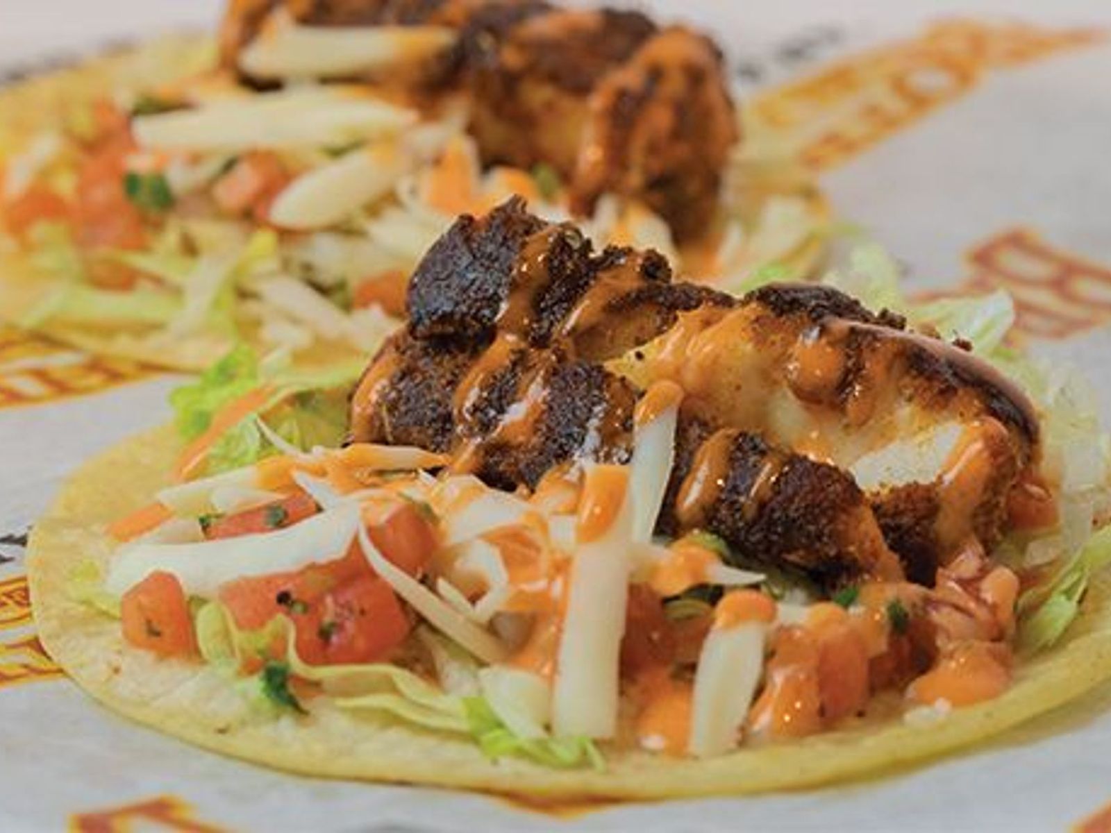 Order Cajun Sriracha Fish Tacos food online from Brothers Bar & Grill store, Fort Collins on bringmethat.com