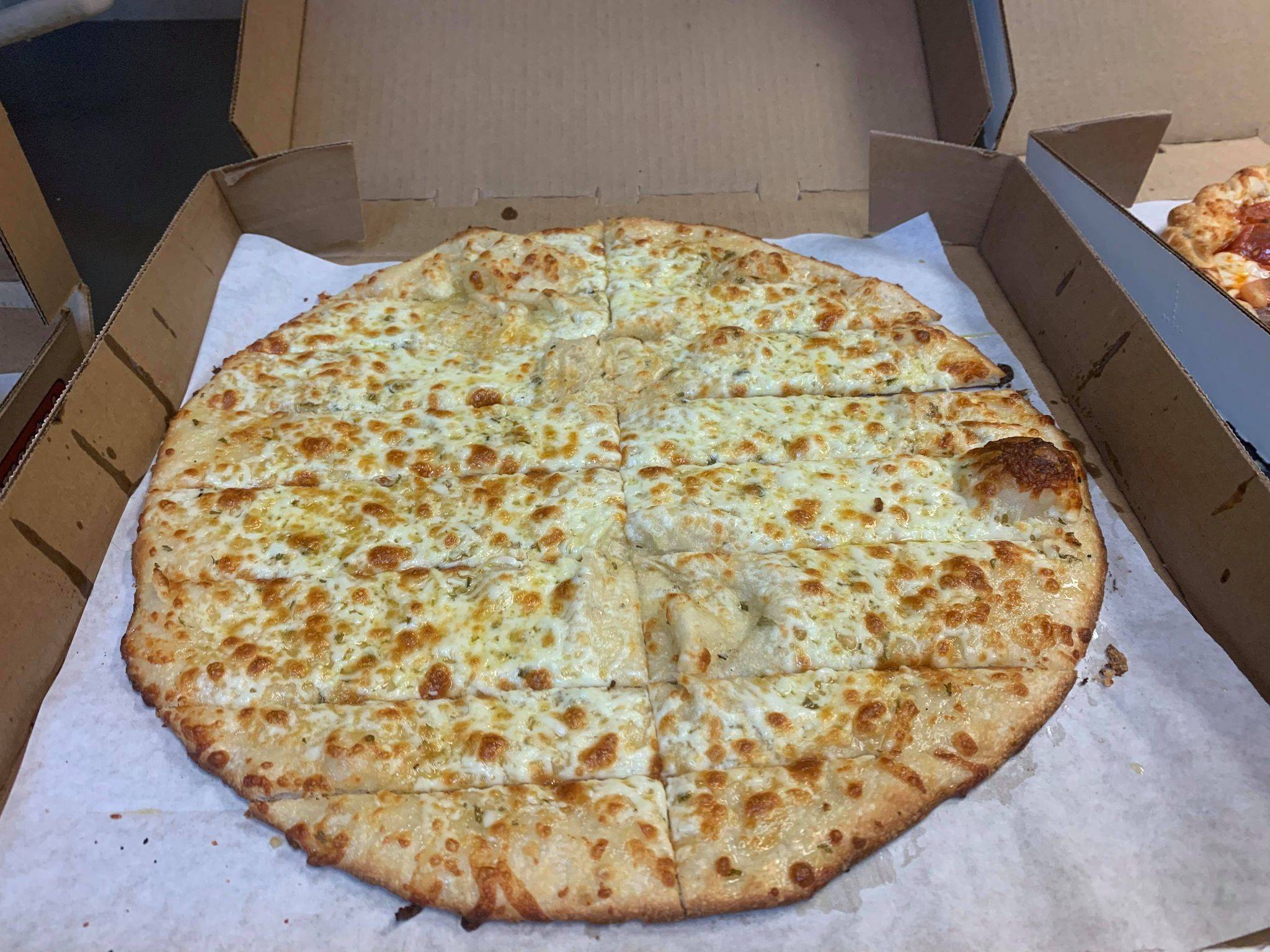 Order Large Cheese Sticks food online from Conans Pizza store, Austin on bringmethat.com