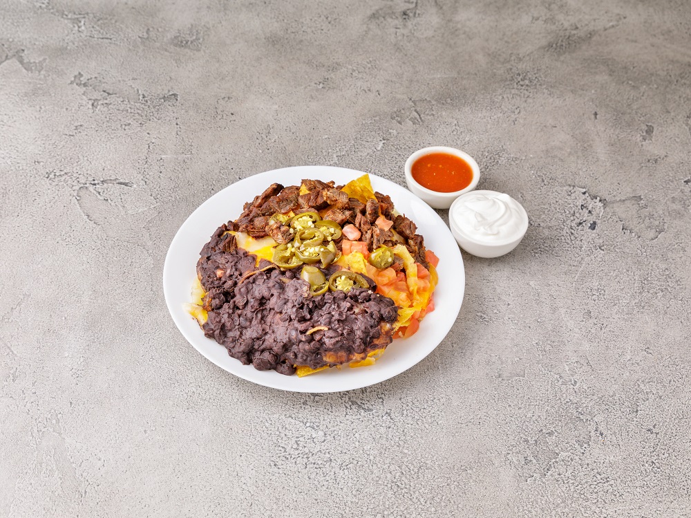 Order N5. Nachos with Steak food online from The First Tortilla Grill store, Rockville Centre on bringmethat.com
