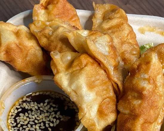 Order Fried Veggie & Pork Dumplings (8pc) food online from Little Chef Chinese Takeout @Aztec Food Hub store, San Diego on bringmethat.com