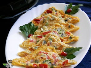 Order Nigerian Omelet food online from Loves Kitchen store, Roswell on bringmethat.com