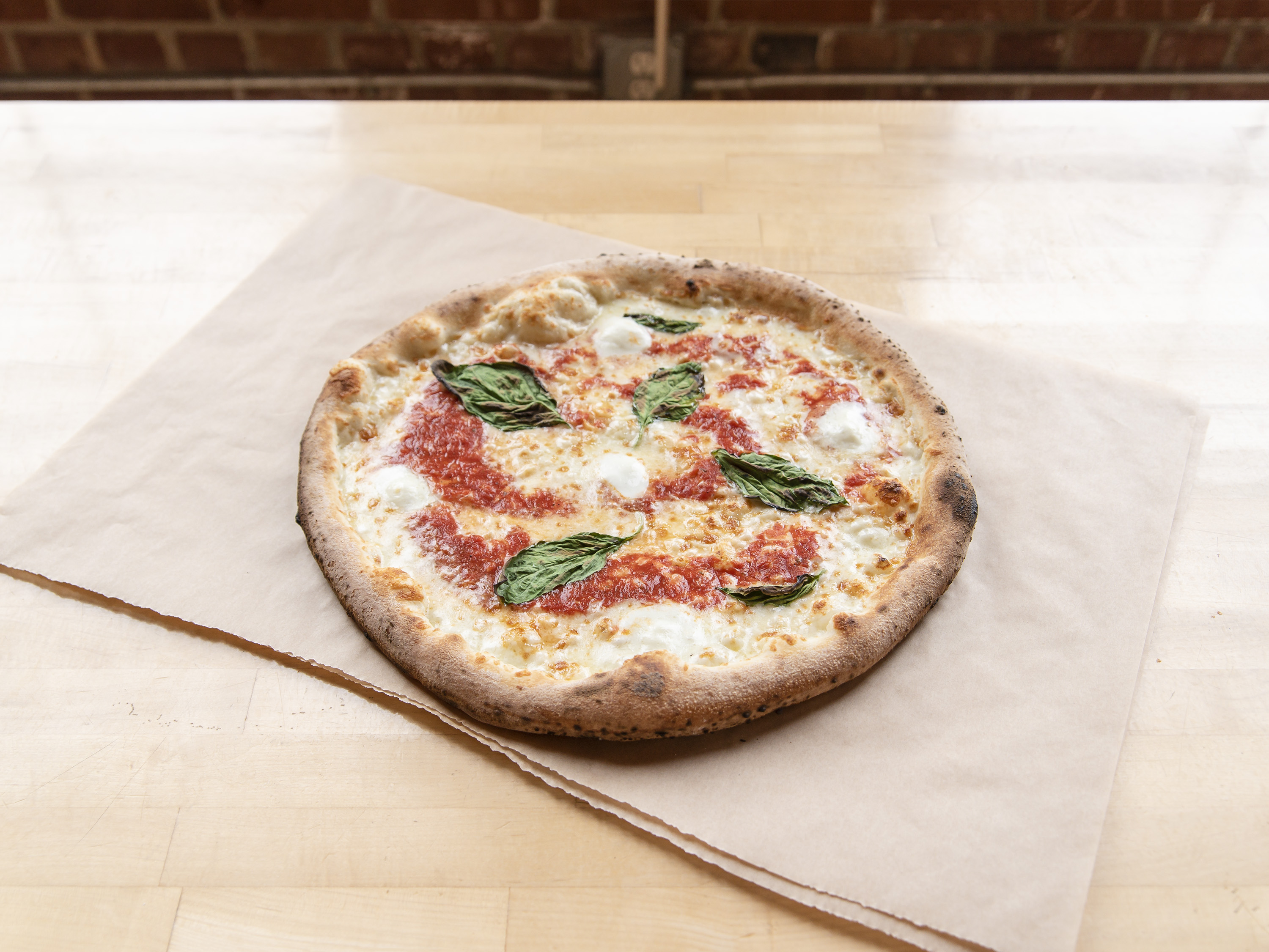 Order Margherita D.O.P Pizza food online from Cugino Forno store, Clemmons on bringmethat.com