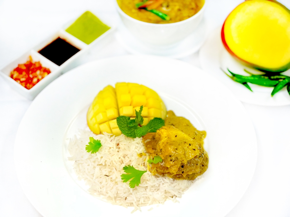 Order Amchur Chicken food online from Coromandel Cuisine of India store, Orange on bringmethat.com