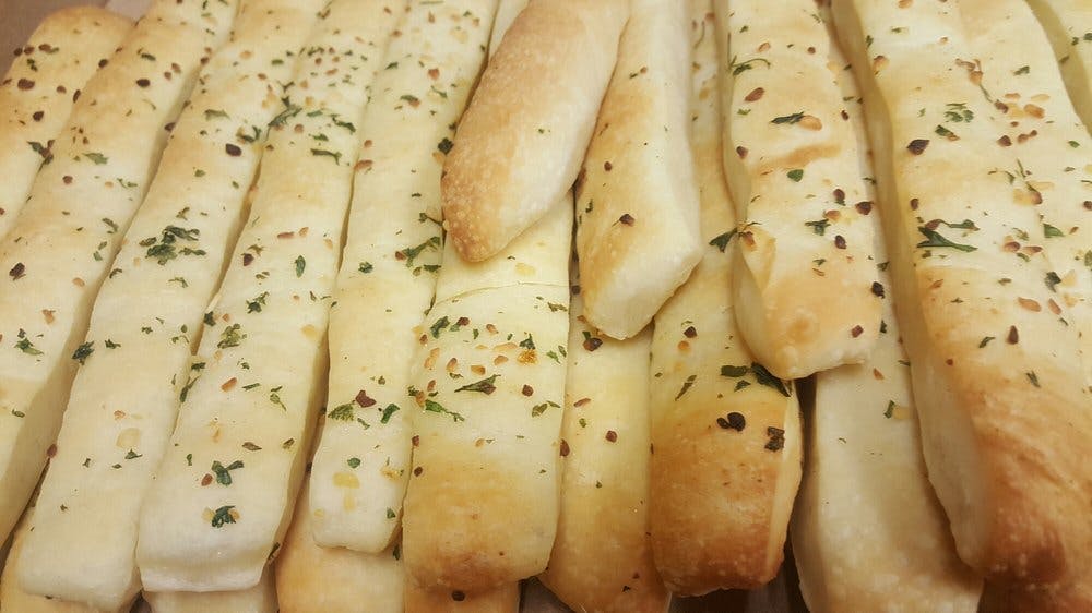 Order Hot Garlic Bread - Appetizer food online from Chicagos Pizza store, San Antonio on bringmethat.com