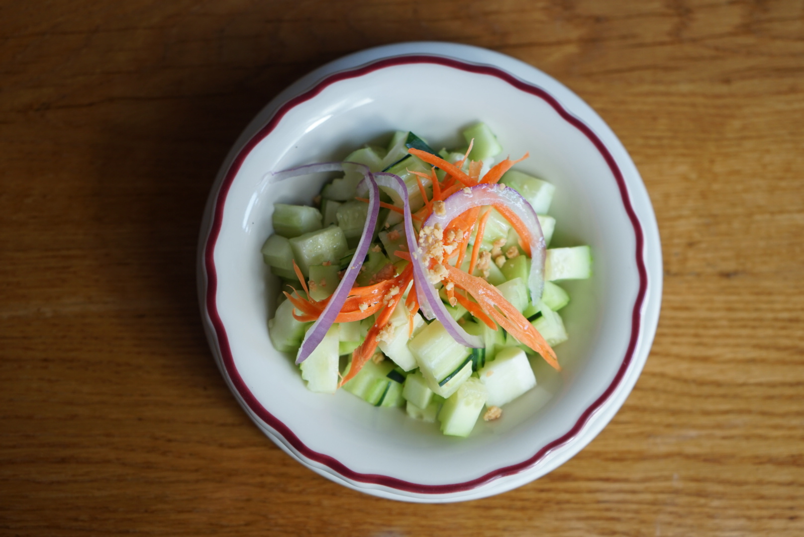 Order Cucumber Salad food online from Lers Ros Thai  store, San Francisco on bringmethat.com