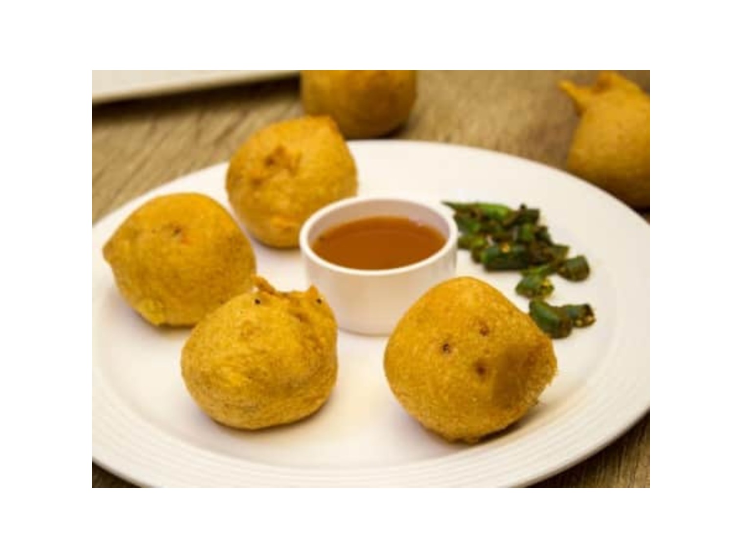 Order Aloo Bonda food online from Cafe India store, Franklin on bringmethat.com