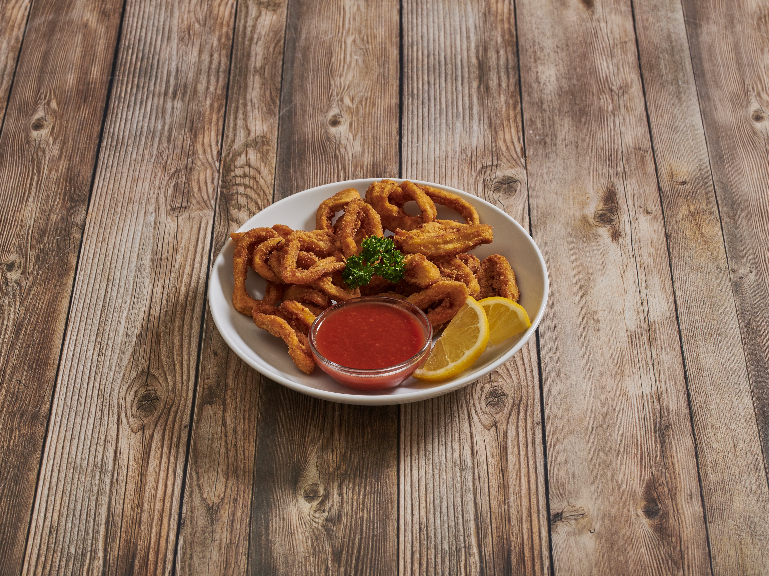 Order Fried Calamari food online from Mario Pizza Cafe store, Allentown on bringmethat.com