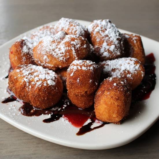 Order Dessert Puffs* food online from Uccello Ristorante store, Grand Rapids on bringmethat.com