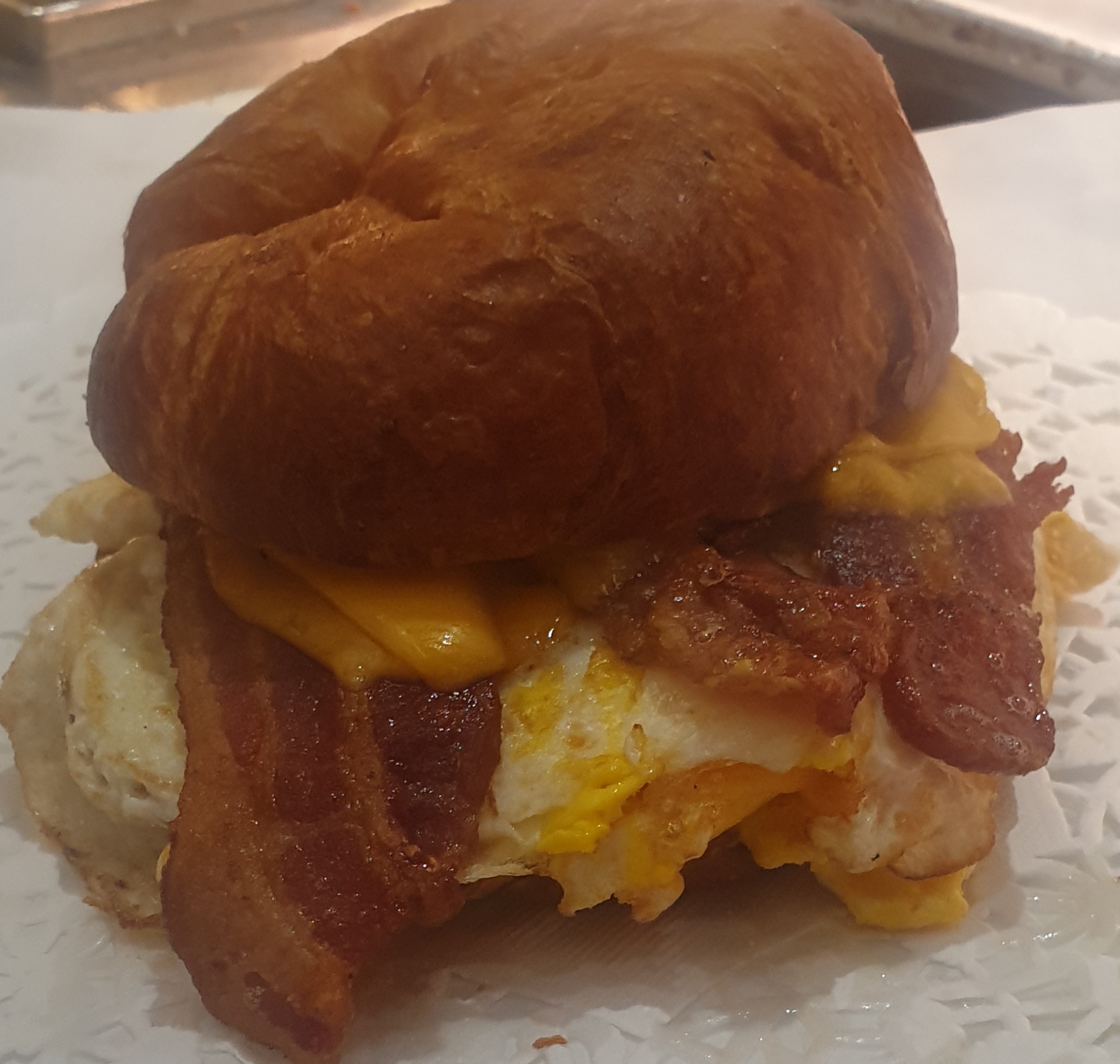 Order 4B-2 Eggs, Bacon and Cheese on Croissant food online from Taz Cafe store, New York on bringmethat.com