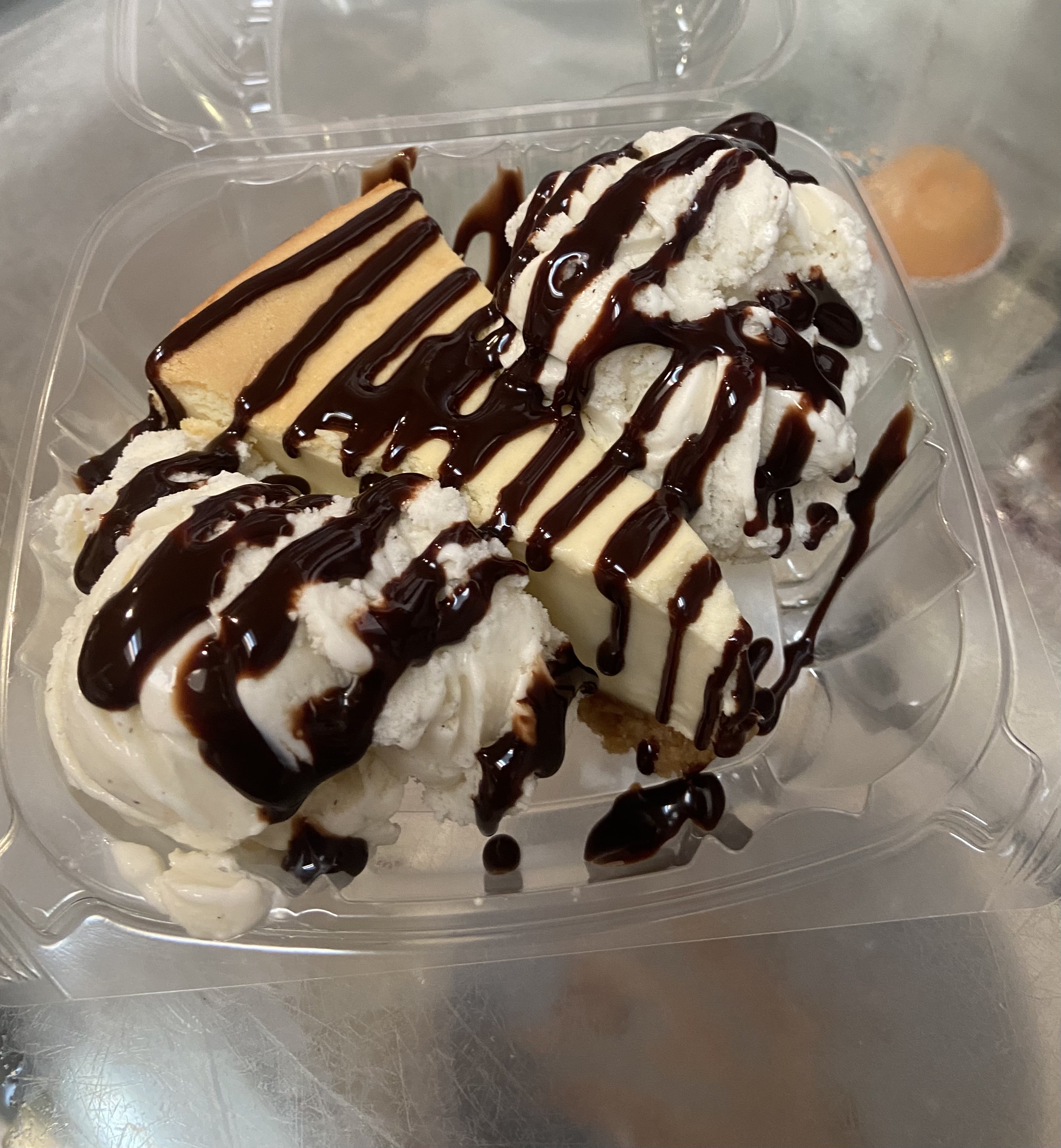 Order Cheesecake with Ice Cream and Chocolate Syrup food online from Shef's Pizza & Deli store, Philadelphia on bringmethat.com