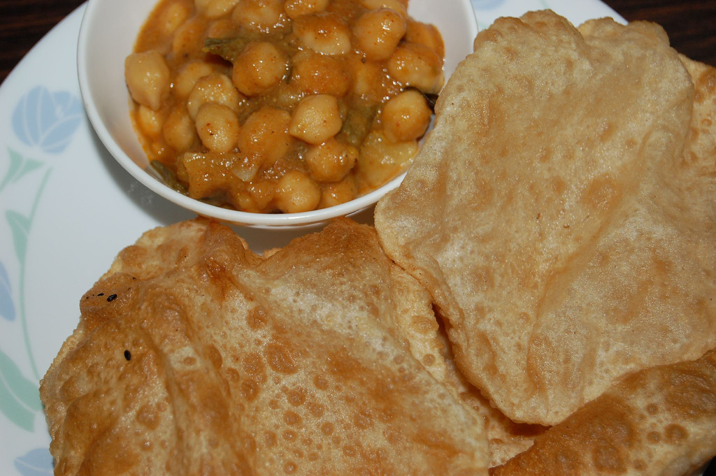 Order Chana Masala with 2 Puri's (FREE) food online from Biryani Pointe store, Lombard on bringmethat.com