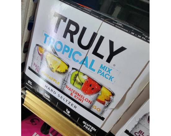 Order TRULY TROPICAL 12PK. 12OZ. CANS  food online from Hub Market & Deli store, San Diego on bringmethat.com