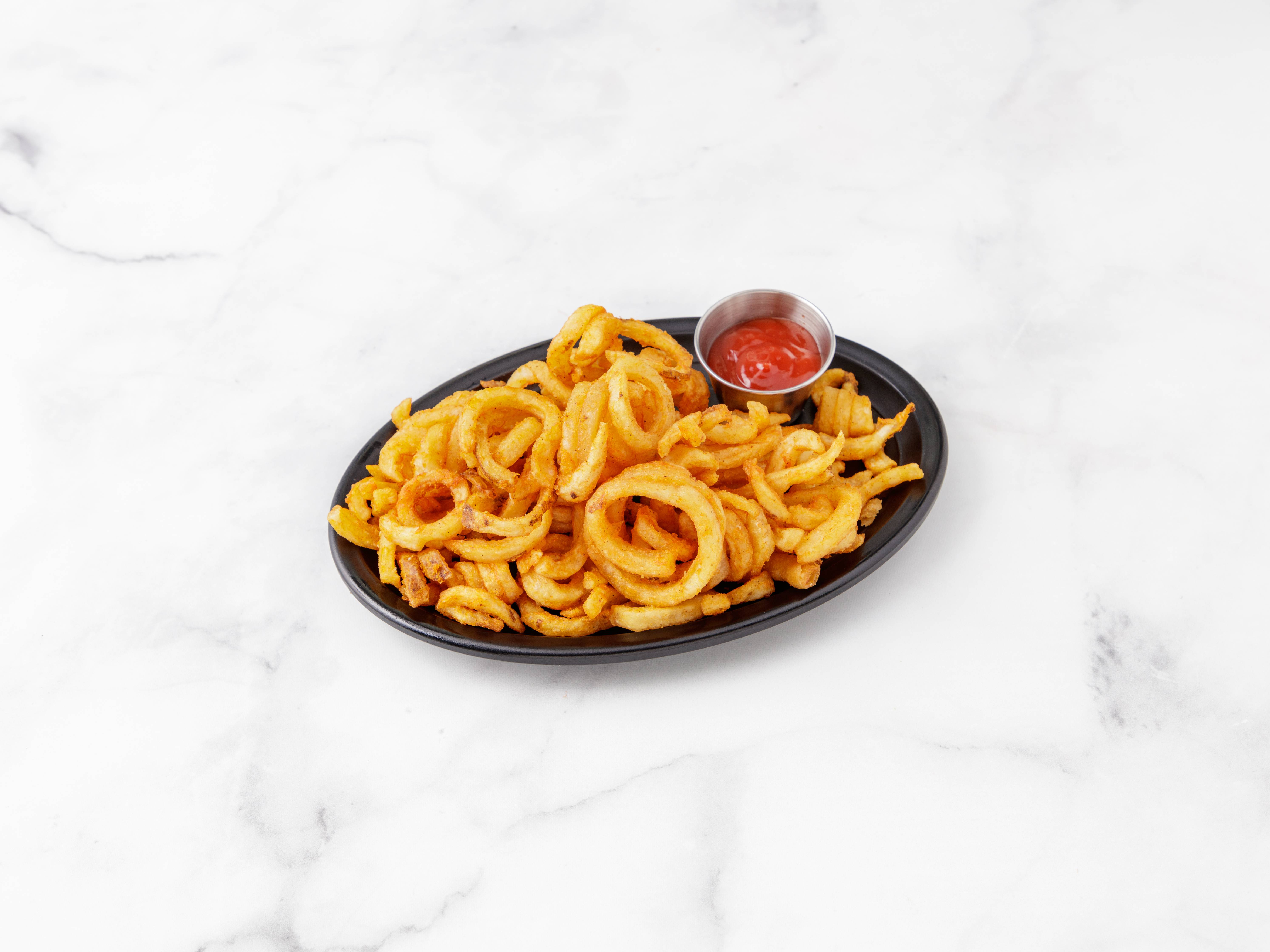 Order Curly Fries food online from More Than Pizza store, New Haven on bringmethat.com