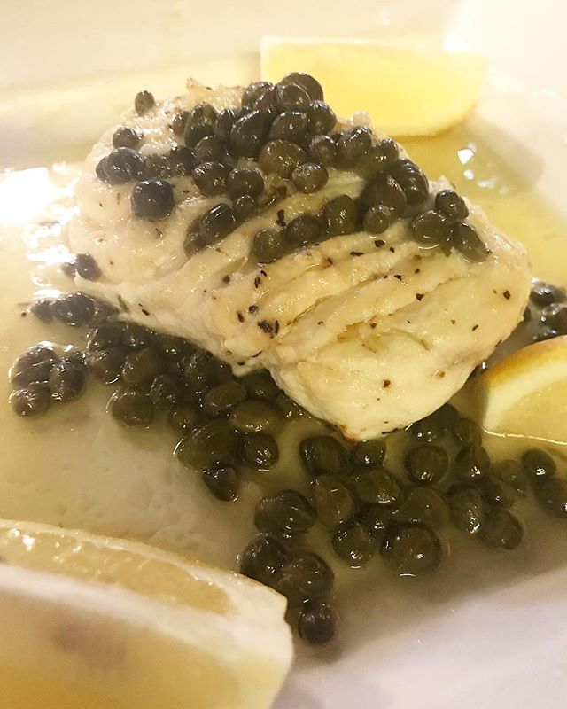 Order Halibut with Butter caper sauce food online from Antonio Pizzeria & Italian Restaurant store,  Sherman Oaks on bringmethat.com