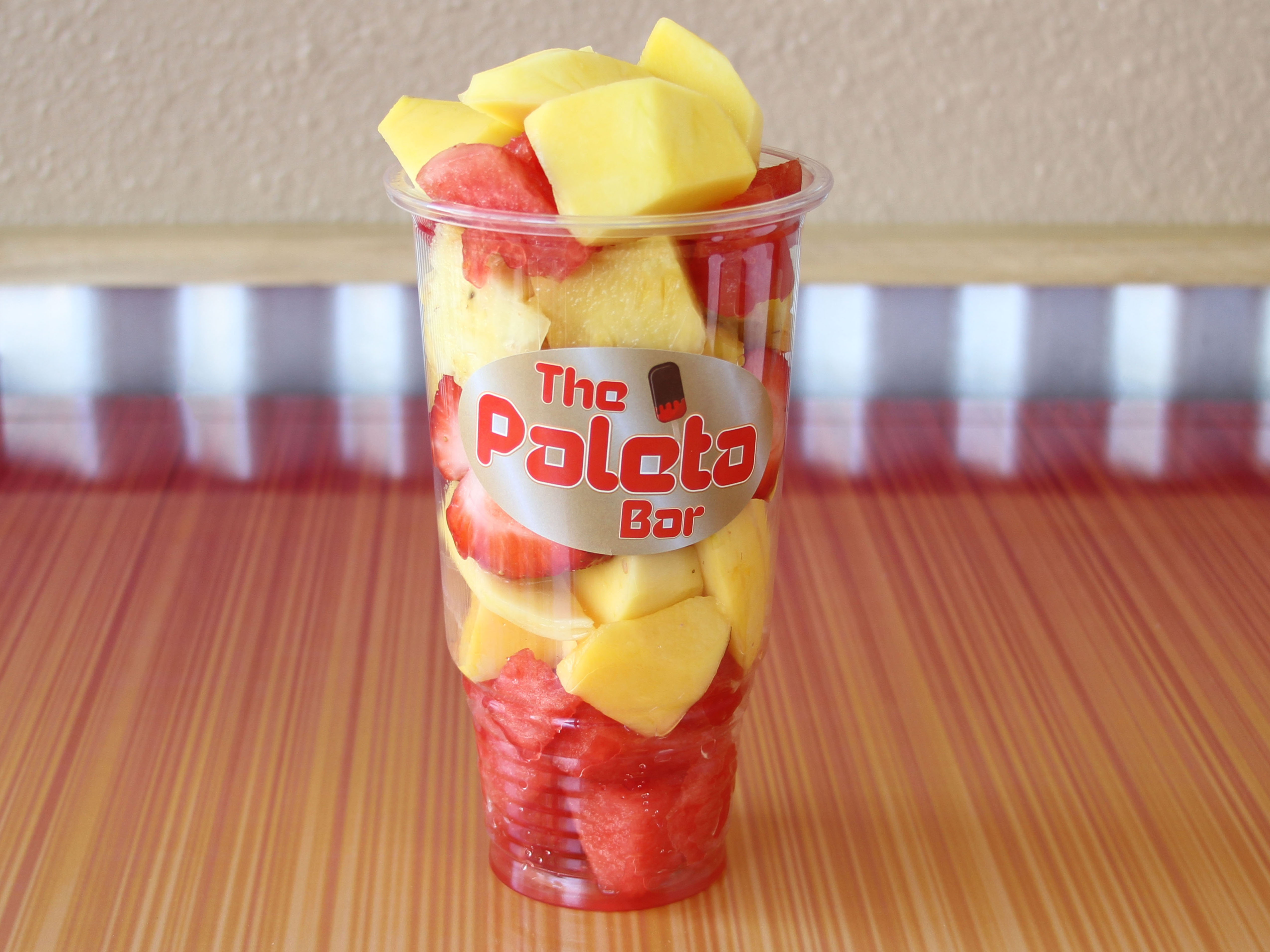 Order Fruit with Chile tajin and Lime food online from The Paleta Bar store, Albuquerque on bringmethat.com