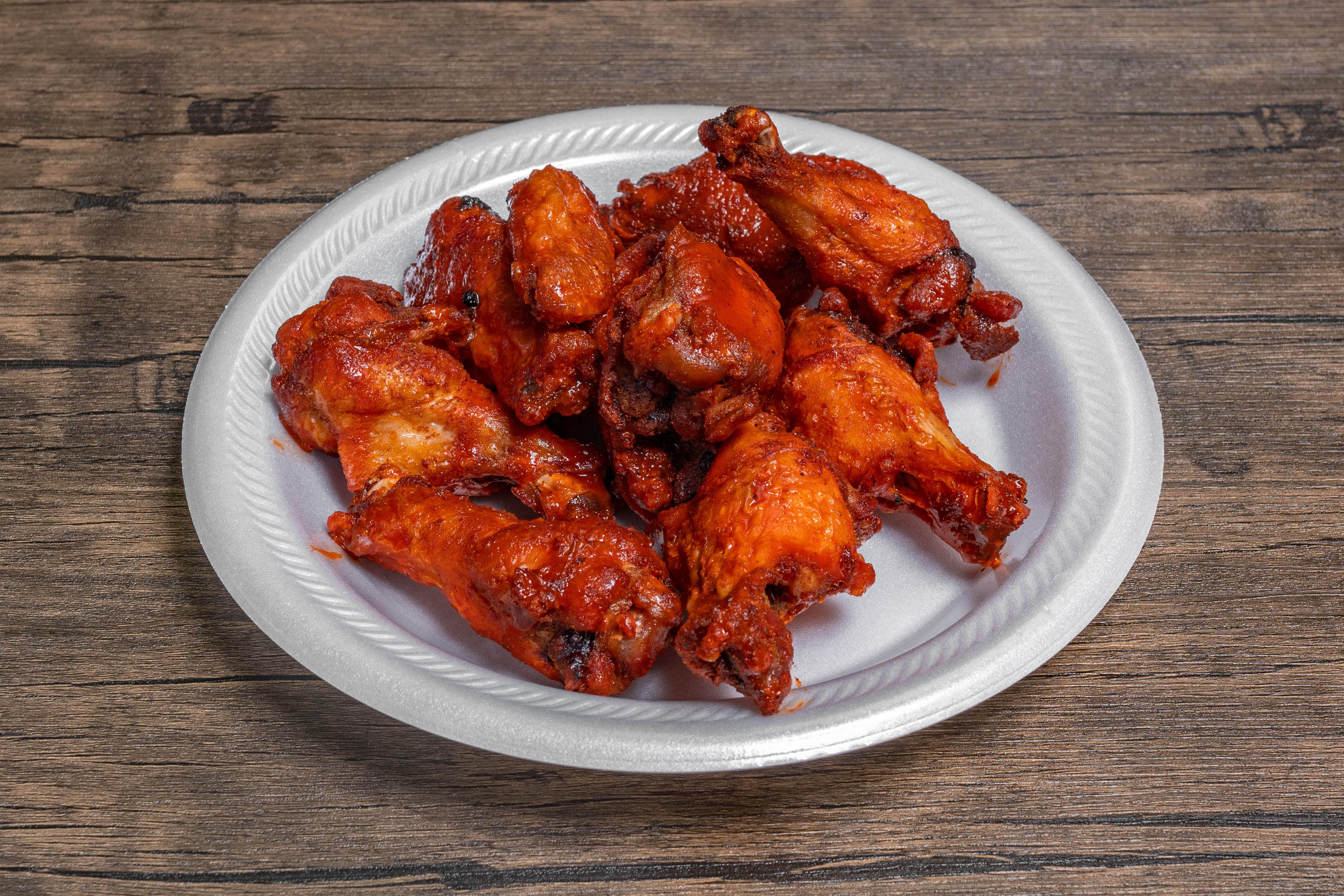 Order BBQ Wings with Sauce - 8 Pieces food online from Milano Pizza store, Frankston on bringmethat.com