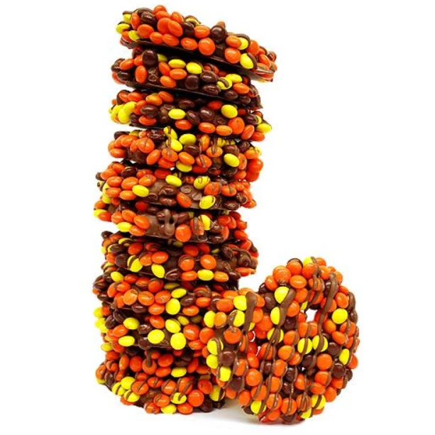Order Gourmet Milk Chocolate Reese's Pieces Covered Pretzel Twists food online from All City Candy store, Cleveland on bringmethat.com
