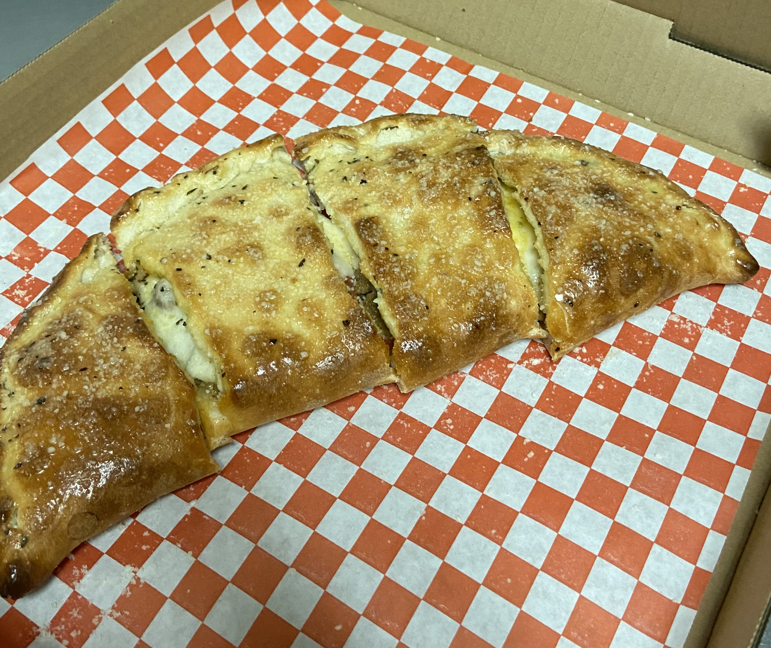 Order Large New York calzone 14” 3 toppings  food online from Papa G's Pizza, Pasta Cafe store, Wildomar on bringmethat.com
