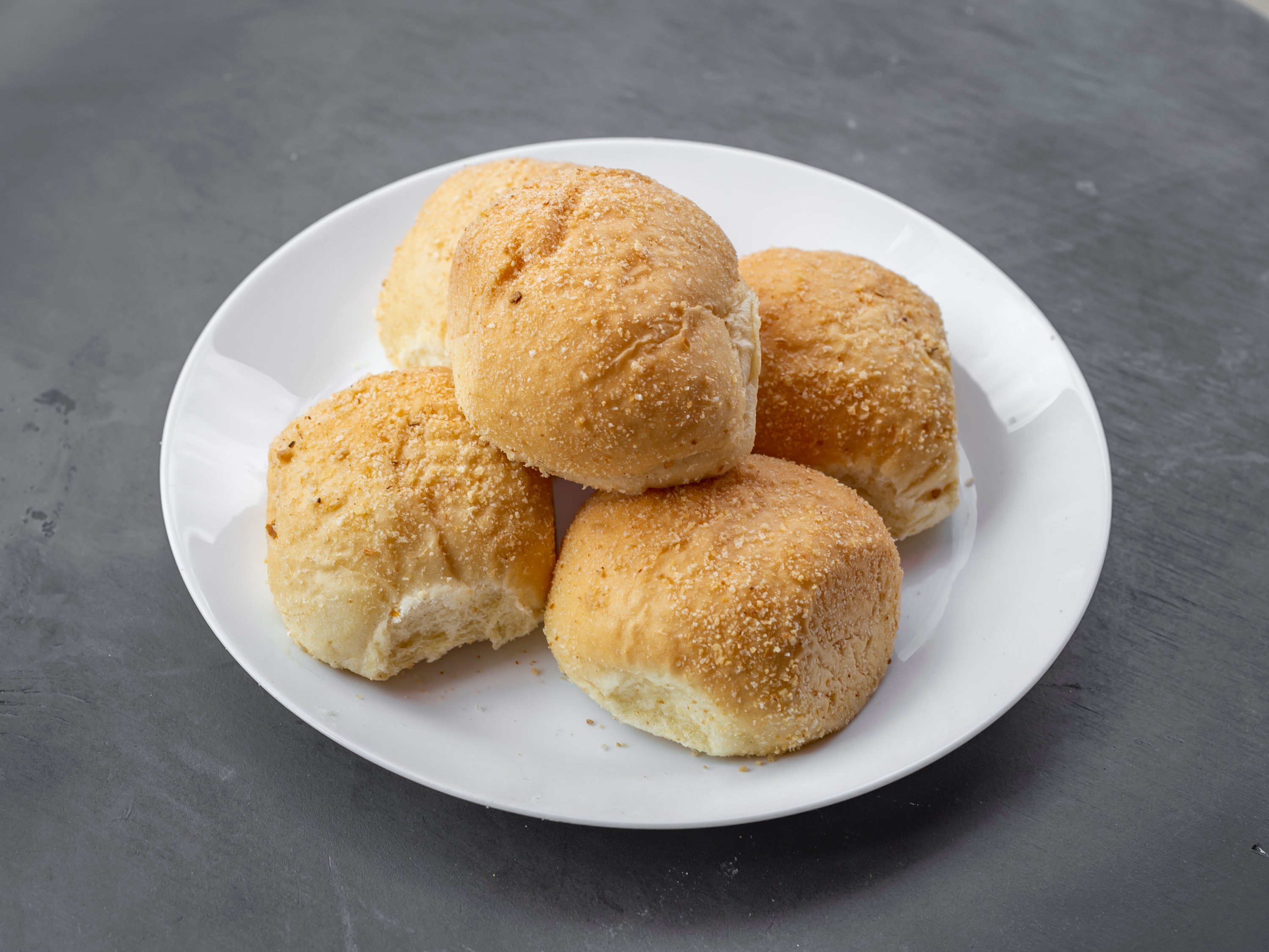 Order 8 Pieces Plain Pandesal food online from Bev Bakery By Rjp store, Jersey City on bringmethat.com