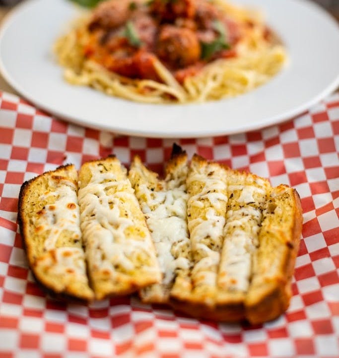 Order Garlic Bread with Cheese - Half Loaf food online from Pasta Glory store, San Francisco on bringmethat.com