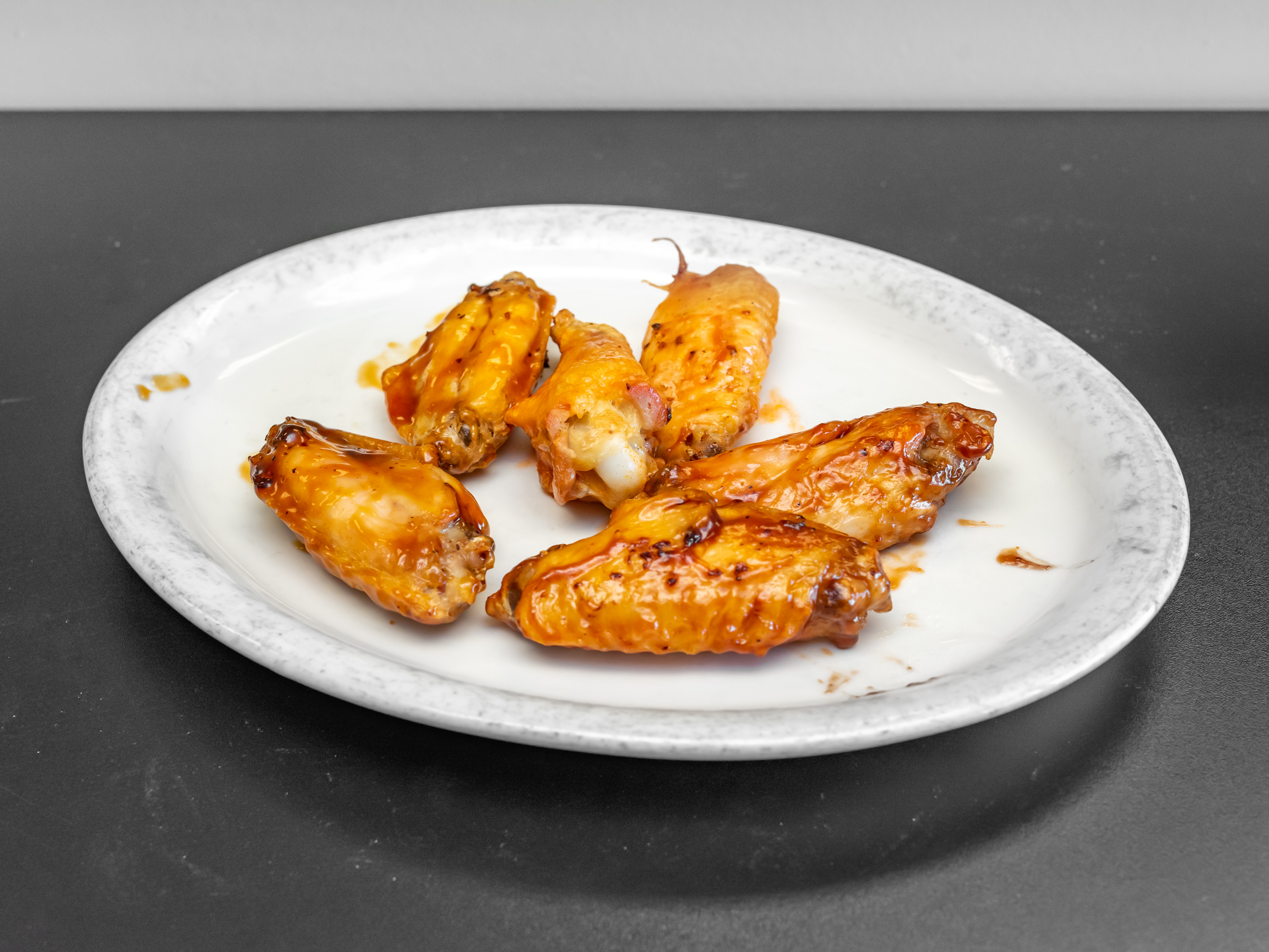Order Hot Wings food online from Tonti's Pizzeria store, Parker on bringmethat.com