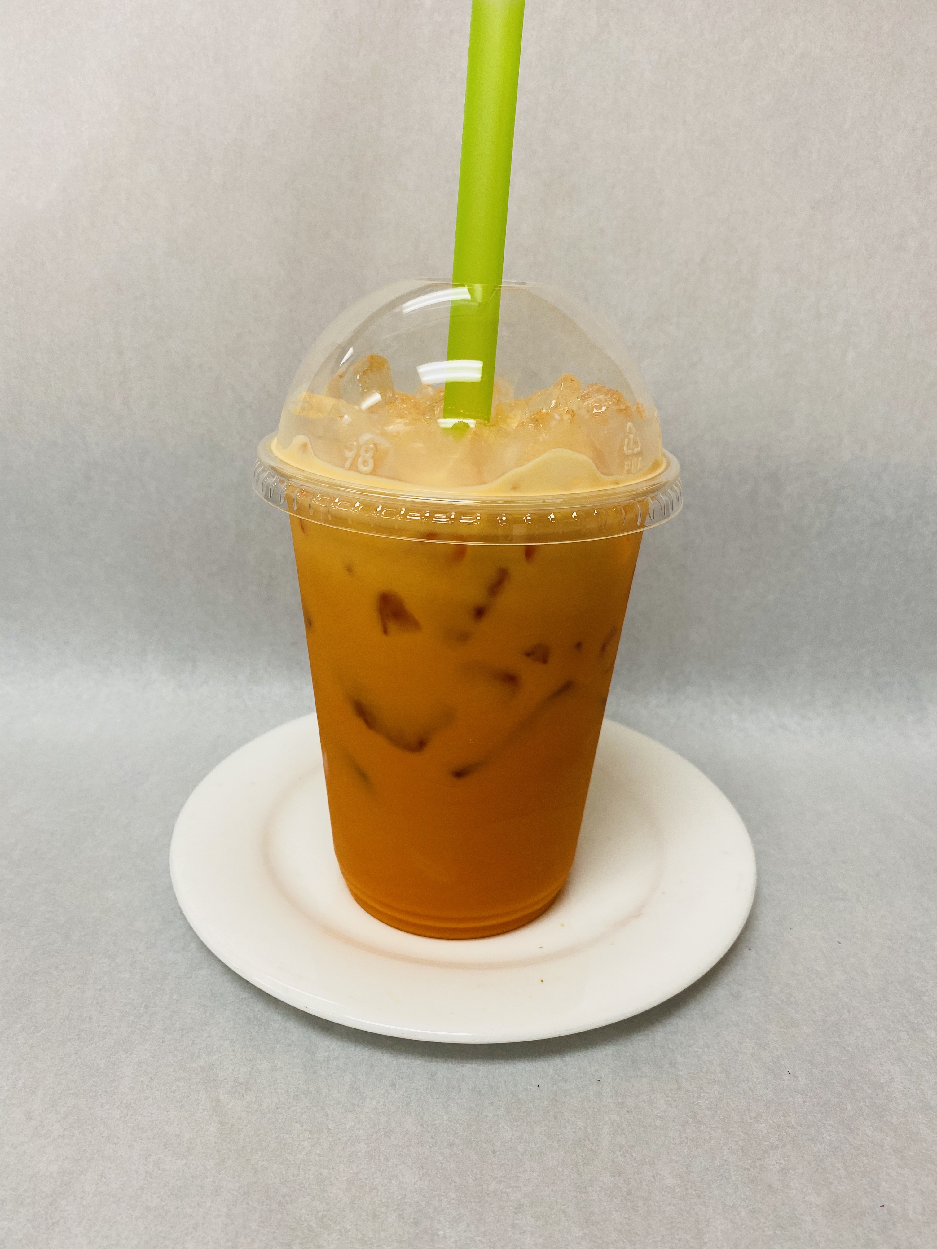 Order Thai Tea (Ice) food online from Bagel Place Cafe store, Sunnyvale on bringmethat.com