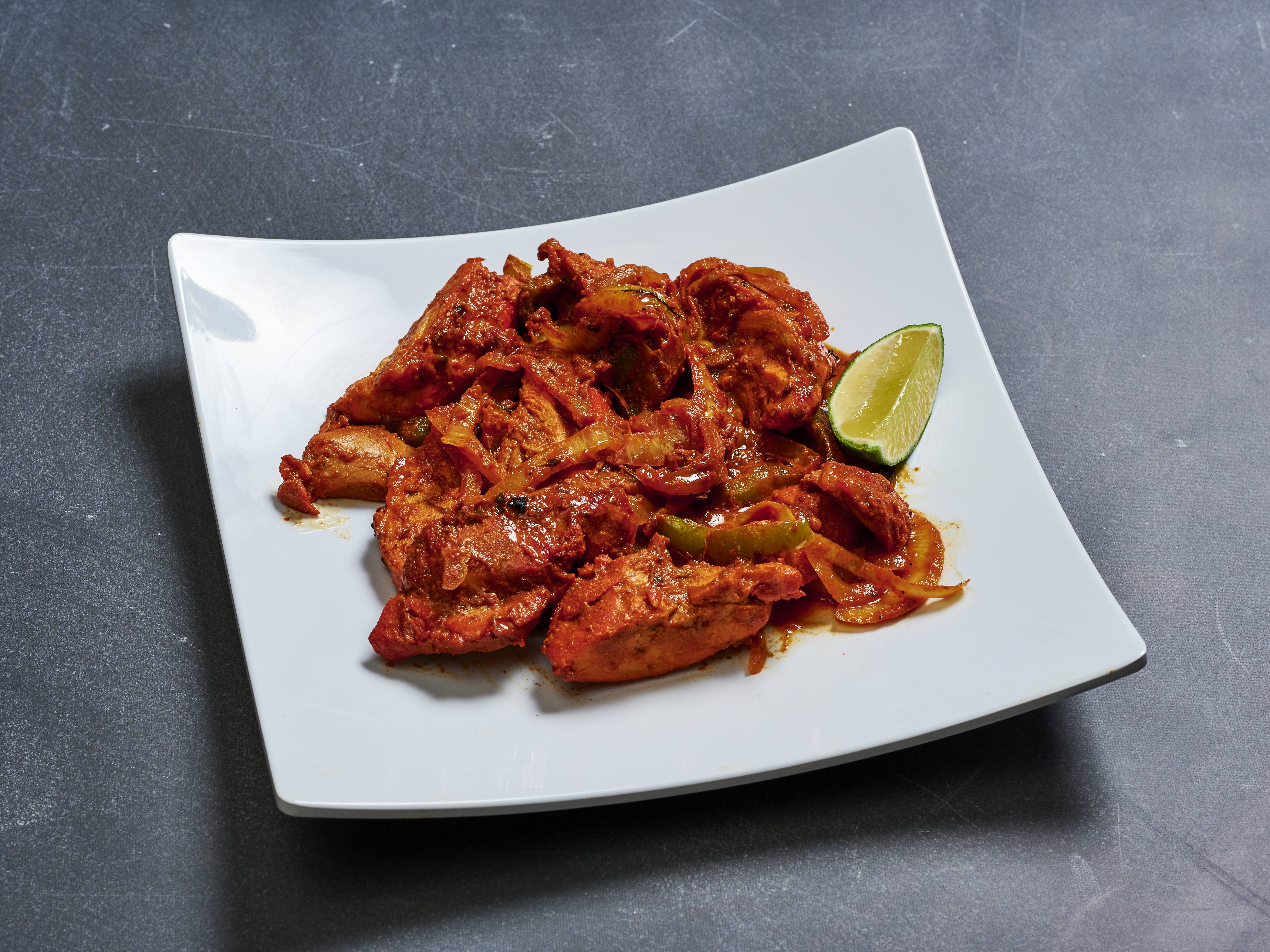 Order Chicken Tikka food online from Bombay Grill store, Seattle on bringmethat.com