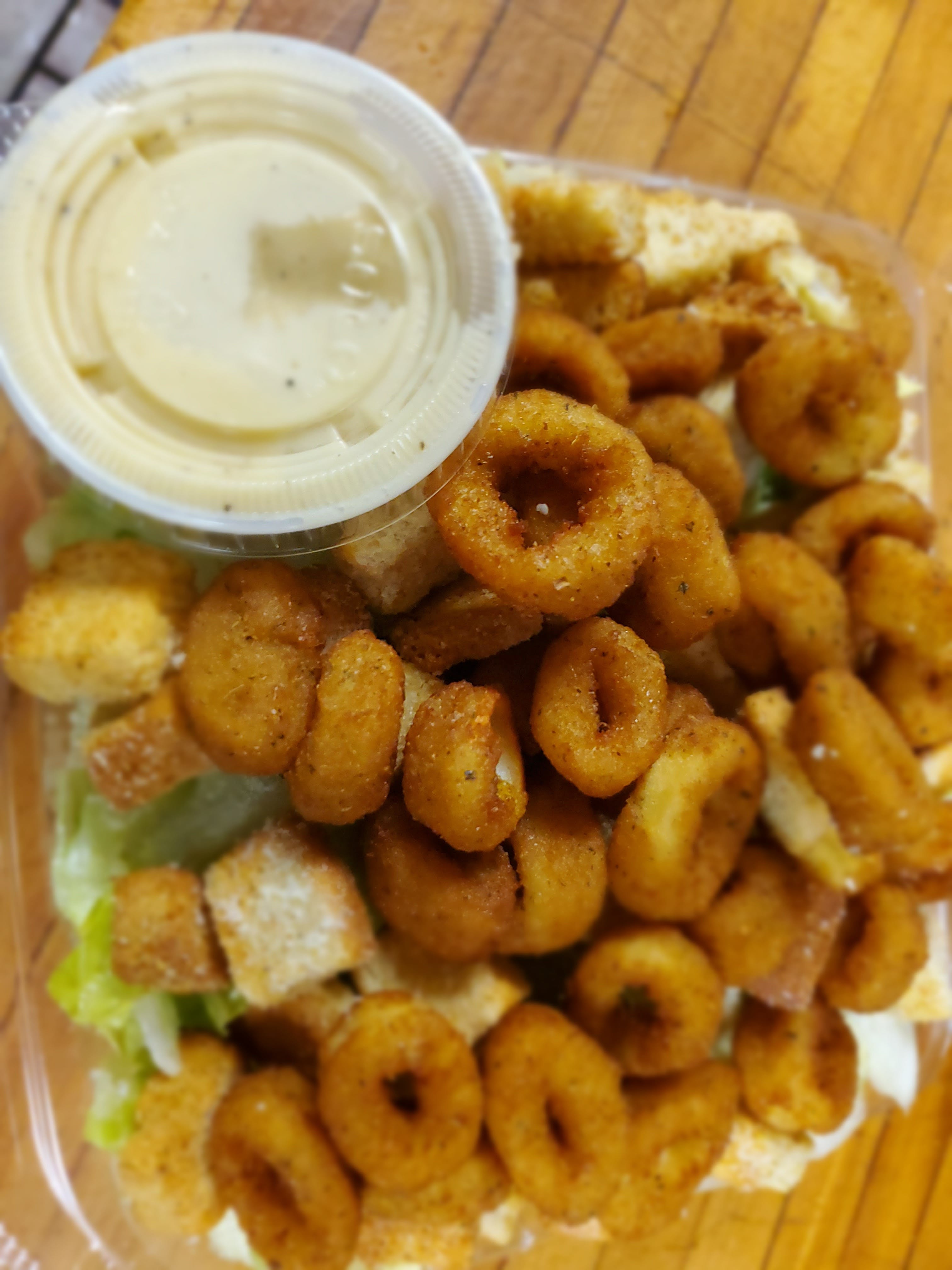 Order Side of Calamari Rings - Side food online from Apollon Roast Beef & Pizza store, Attleboro on bringmethat.com