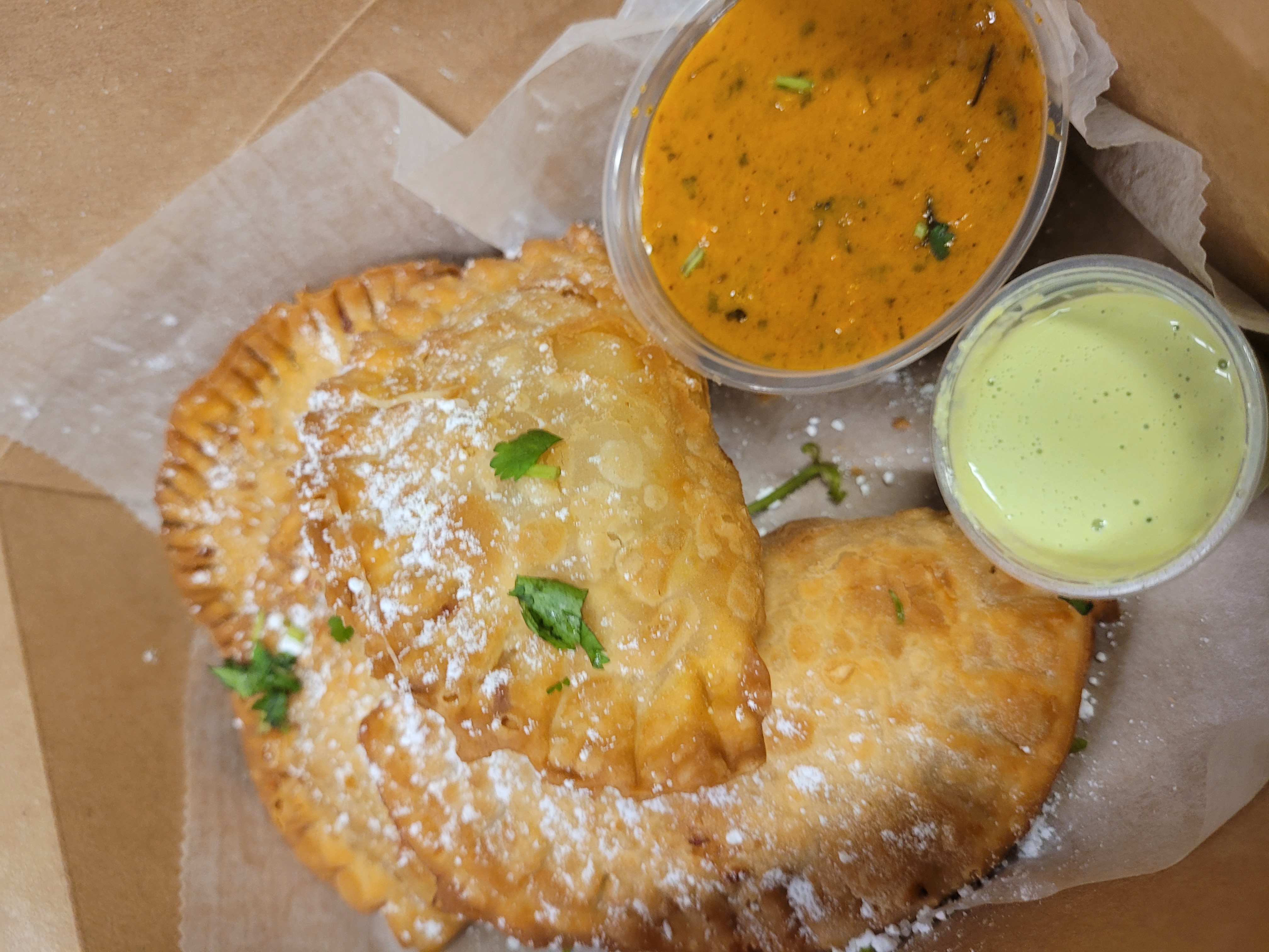Order Butter Chicken Empanadas (4 pieces)  food online from Shirleys India store, New Rochelle on bringmethat.com