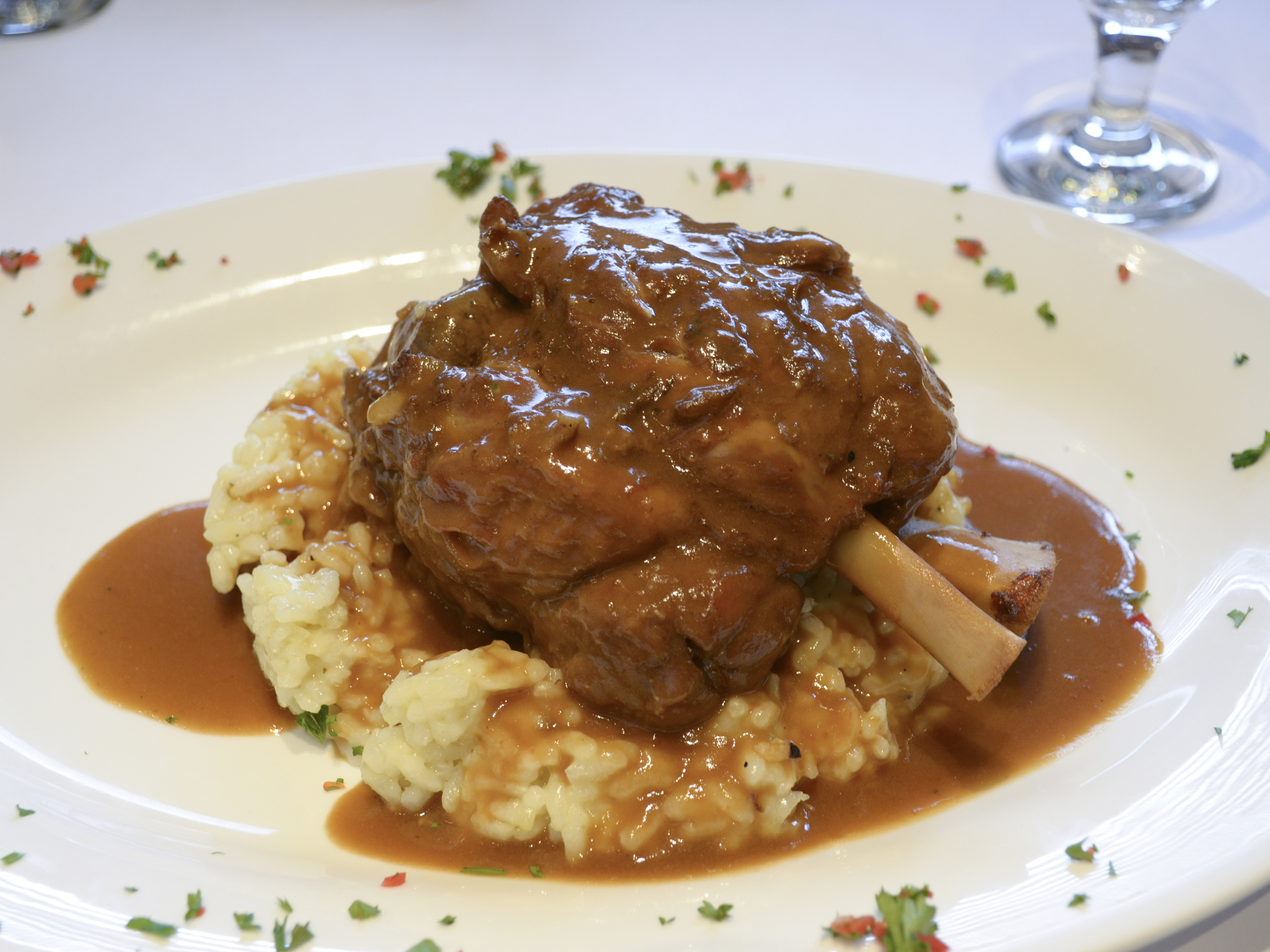 Order Braised Osso Buco Pork Shank food online from Gusto Divino Trattoria fka Mulberry Street of Seaford Restaurant & Bar store, Seaford on bringmethat.com