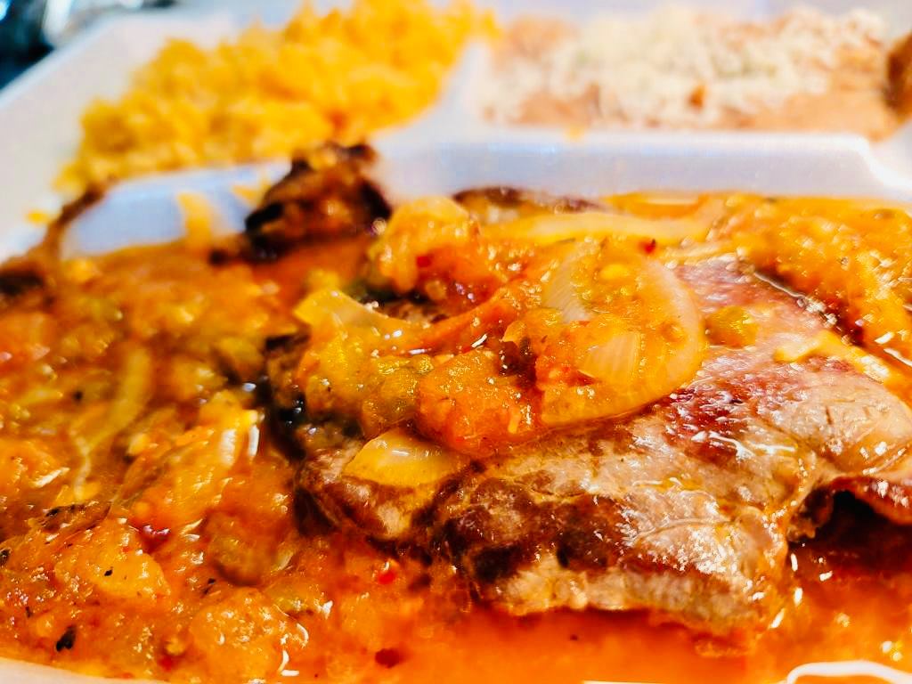 Order Bistec Ranchero food online from Antojitos De Dona Maria store, Summit on bringmethat.com