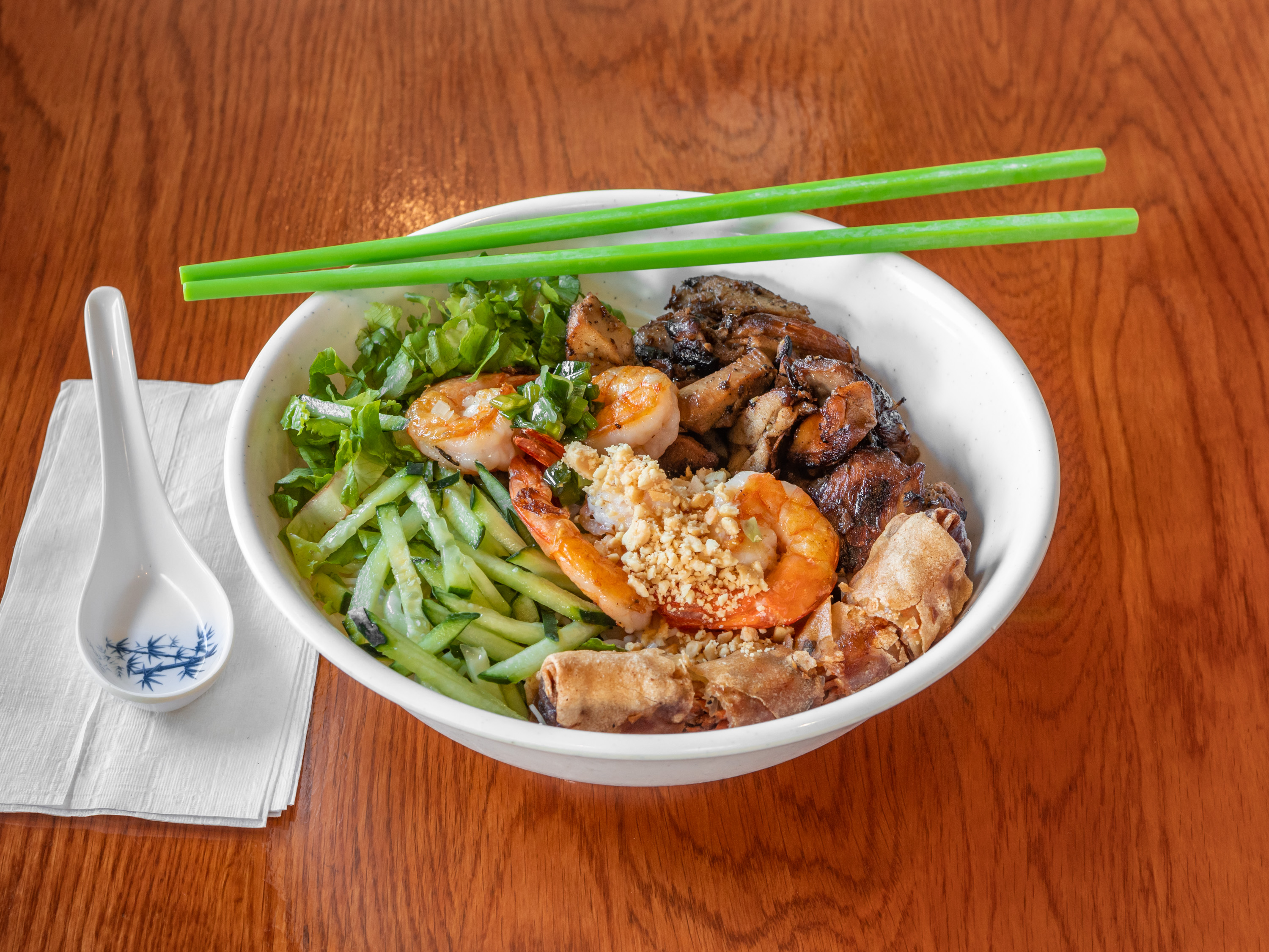 Order 46. Vermicelli with Chicken, Shrimp,and Egg Rolls food online from Pho Hoang store, Austin on bringmethat.com