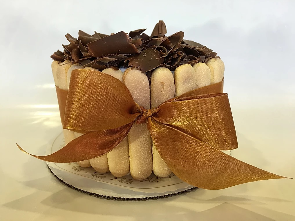 Order Tiramisu Cake food online from Honeymoon Sweets store, Tempe on bringmethat.com