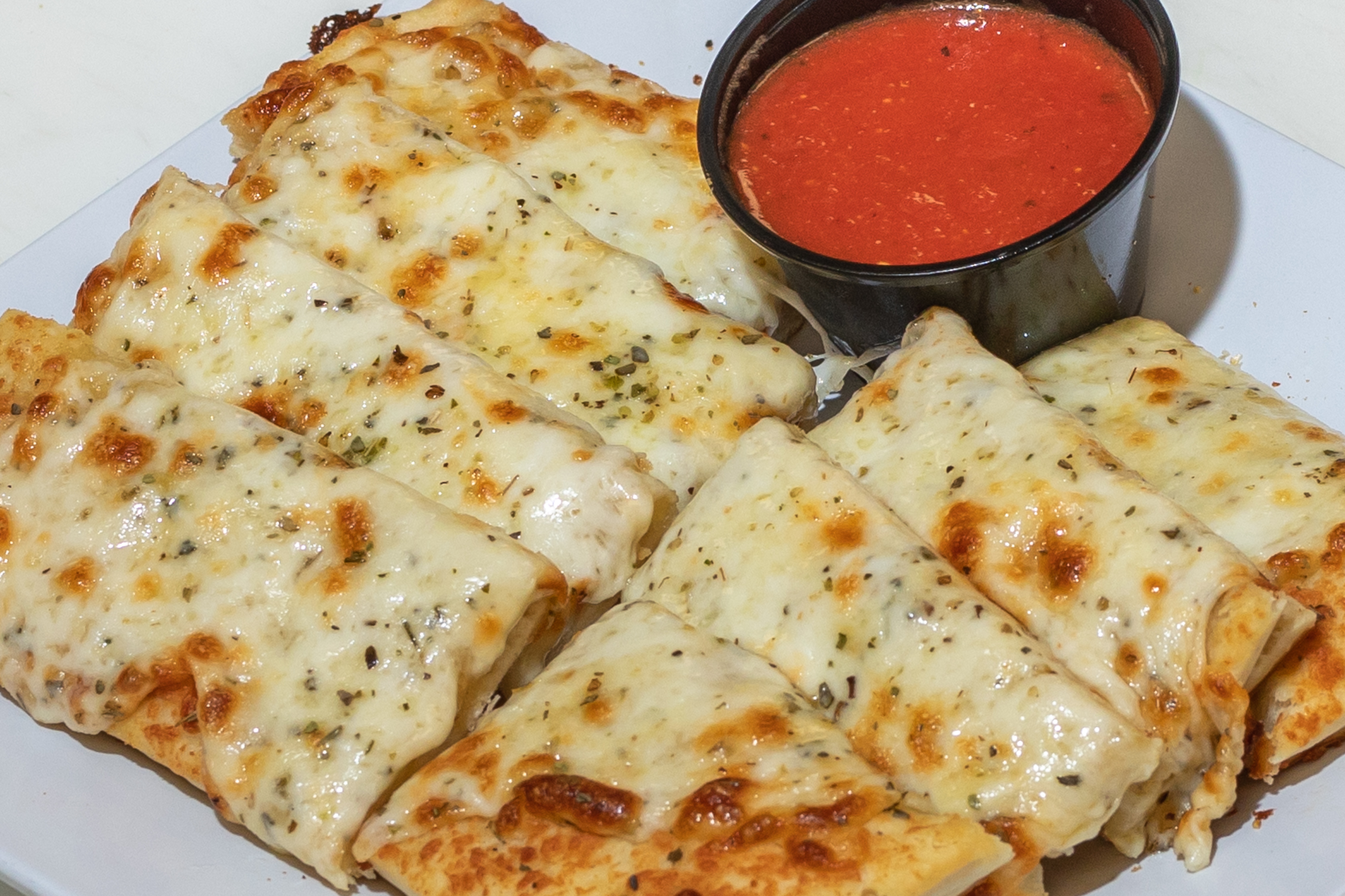 Order Cheesy Bread Sticks food online from Tortorice's Pizza & Catering store, Chicago on bringmethat.com