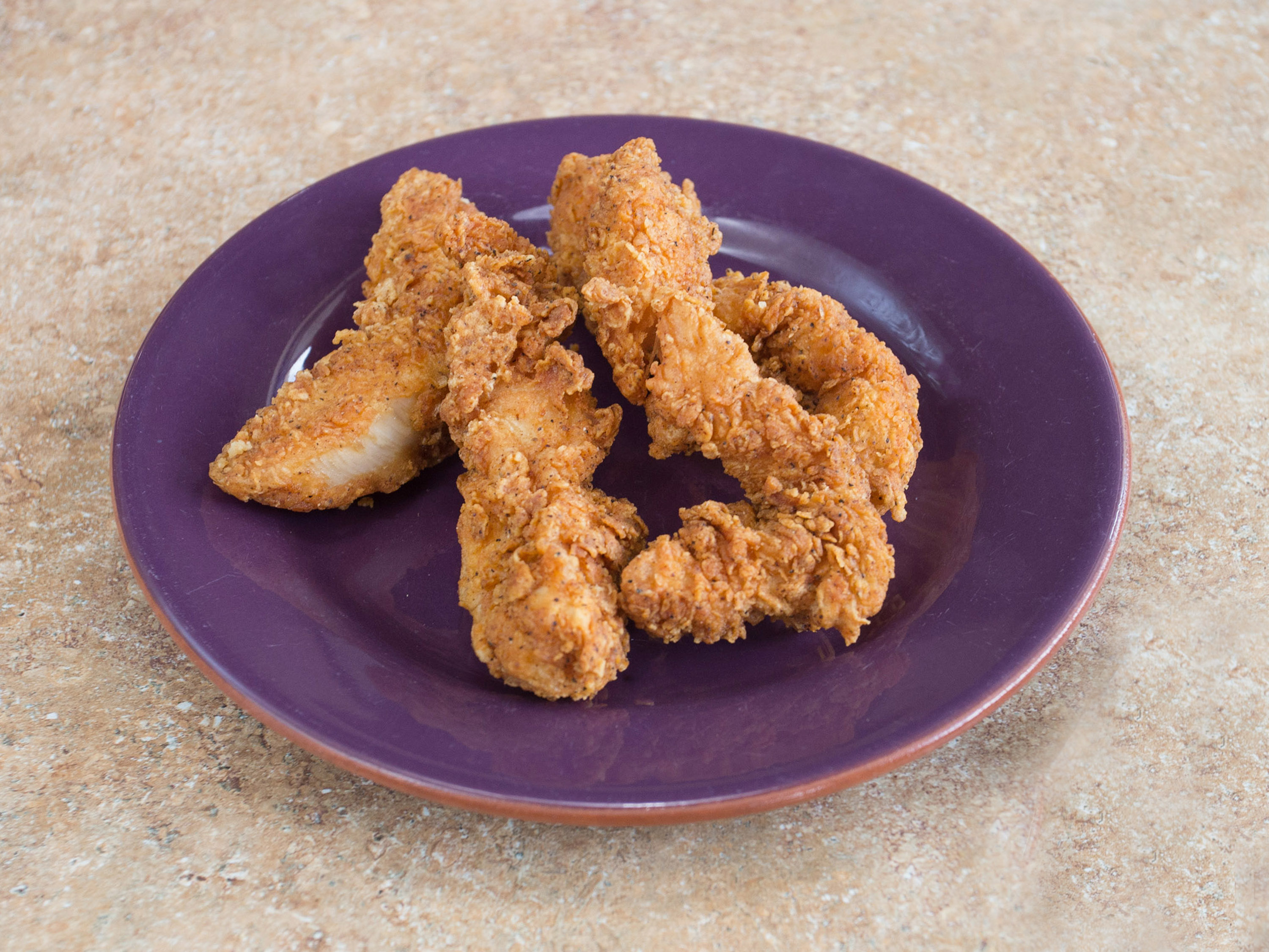 Order 4 Piece Express Spicy Tenders food online from Chicken Express store, Austin on bringmethat.com
