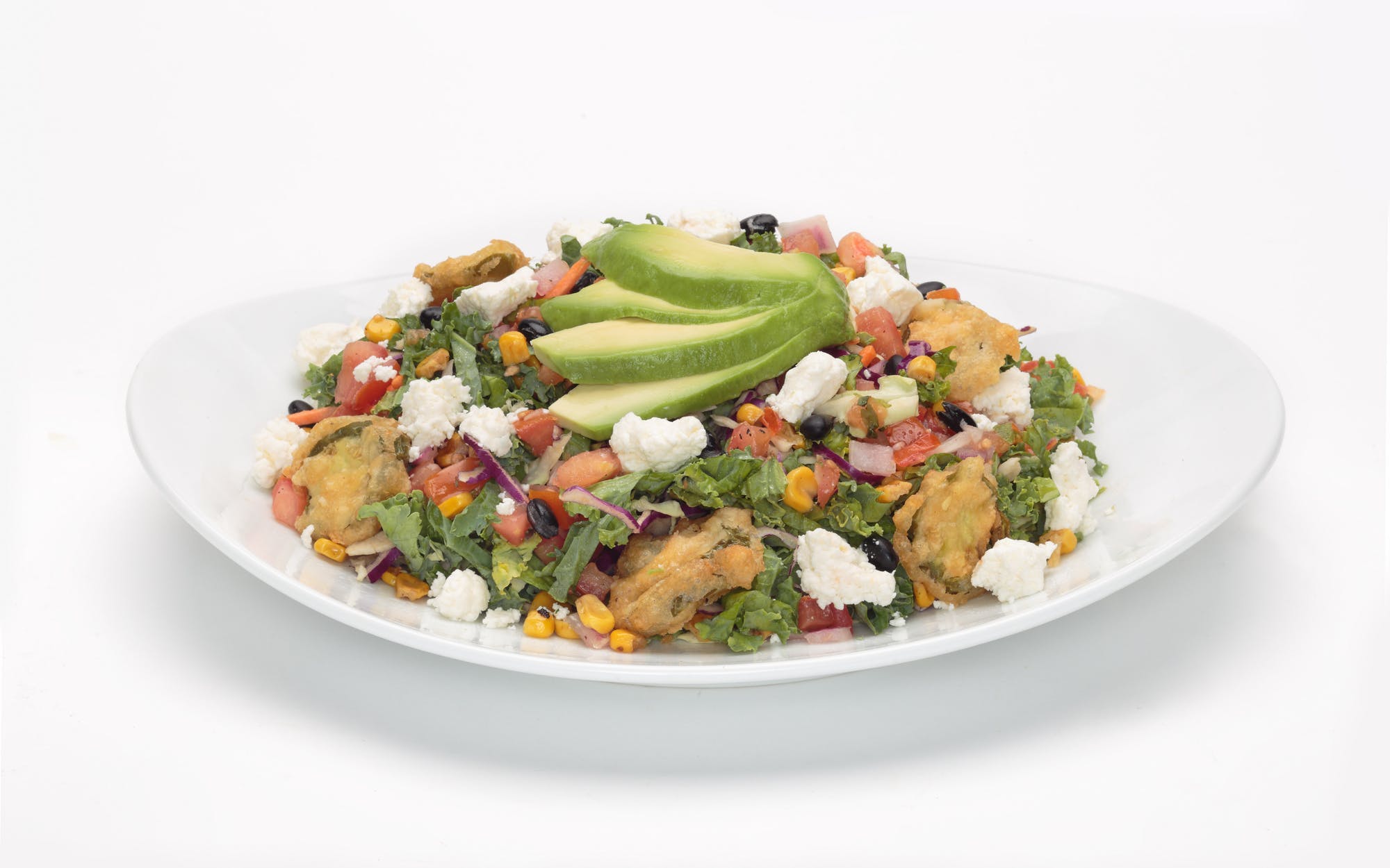 Order Southwestern Kale Salad - Half Size food online from Oggi Sports | Brewhouse | Pizza store, Mission Viejo on bringmethat.com
