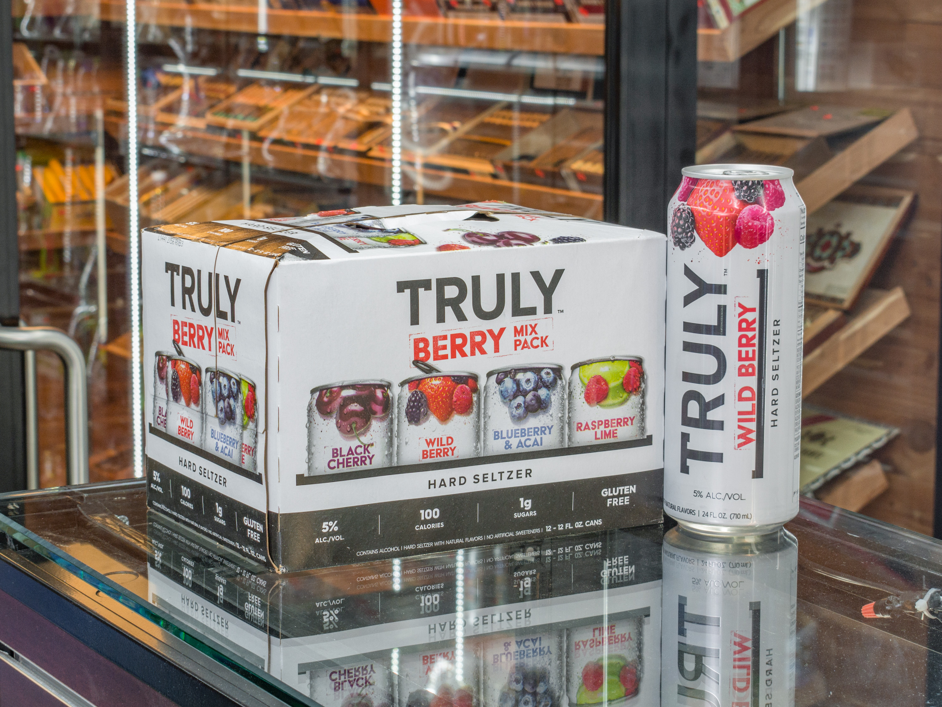 Order 59. 12 Pack of Truly Spiked & Sparkling Berry Variety food online from ELITE CIGARS AND CONVENIENCE INC store, Lindenhurst on bringmethat.com