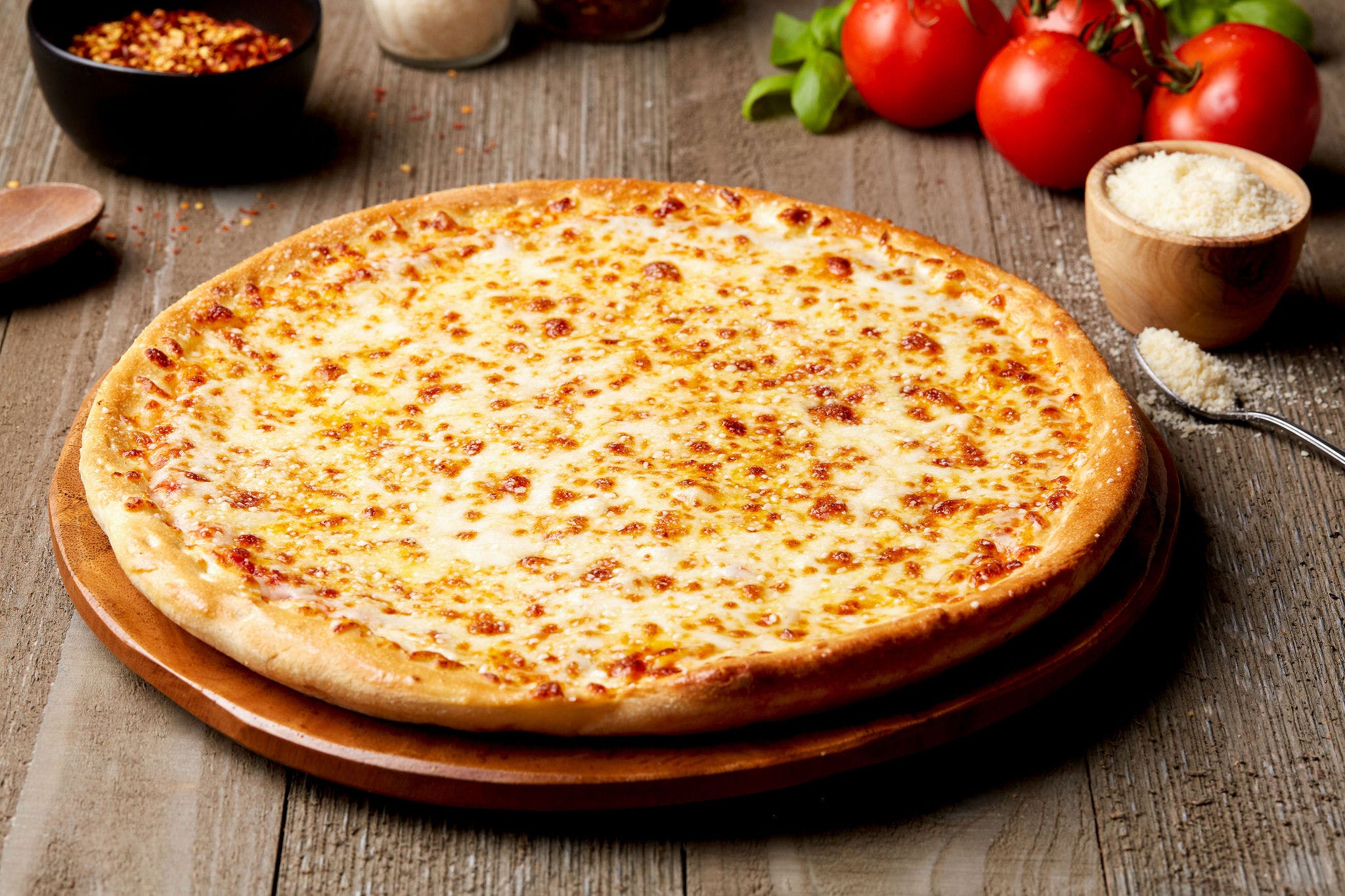 Order Triple Cheese Pizza - Small 9'' food online from Simple Simon Pizza store, Paola on bringmethat.com