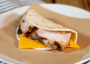 Order Chicken & Cheese Taco food online from Dickey's Barbecue Pit store, Kapolei on bringmethat.com