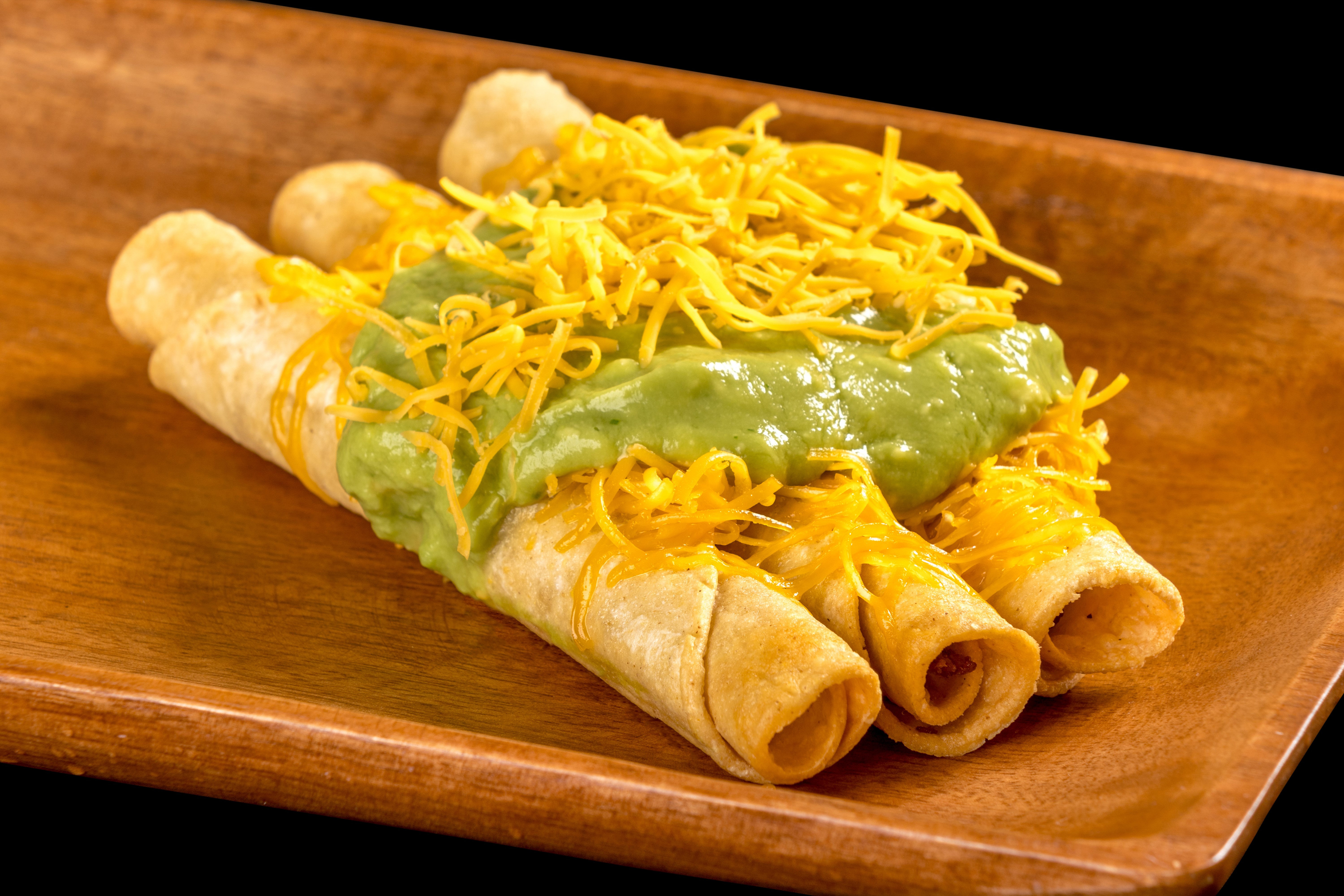 Order 3 Rolled Tacos Cheese with Guacamole food online from Filiberto Mexican Food store, Mesa on bringmethat.com