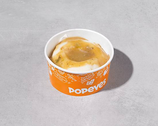 Order Regular Mashed Potatoes with Cajun Gravy food online from Popeyes store, Pasadena on bringmethat.com