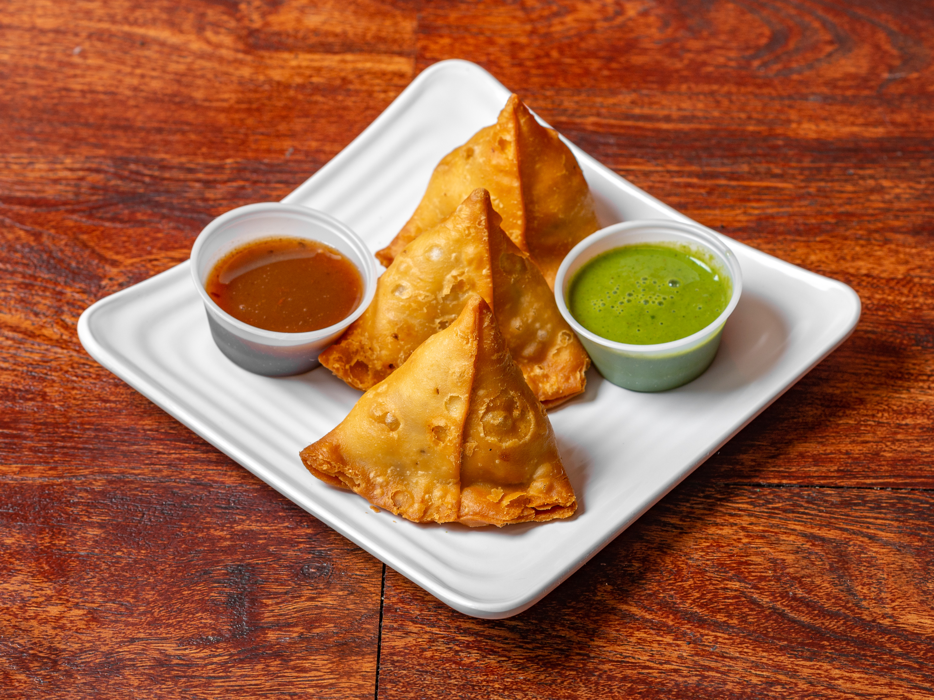 Order Samosa food online from New Ginger Indian Grill store, West Orange on bringmethat.com