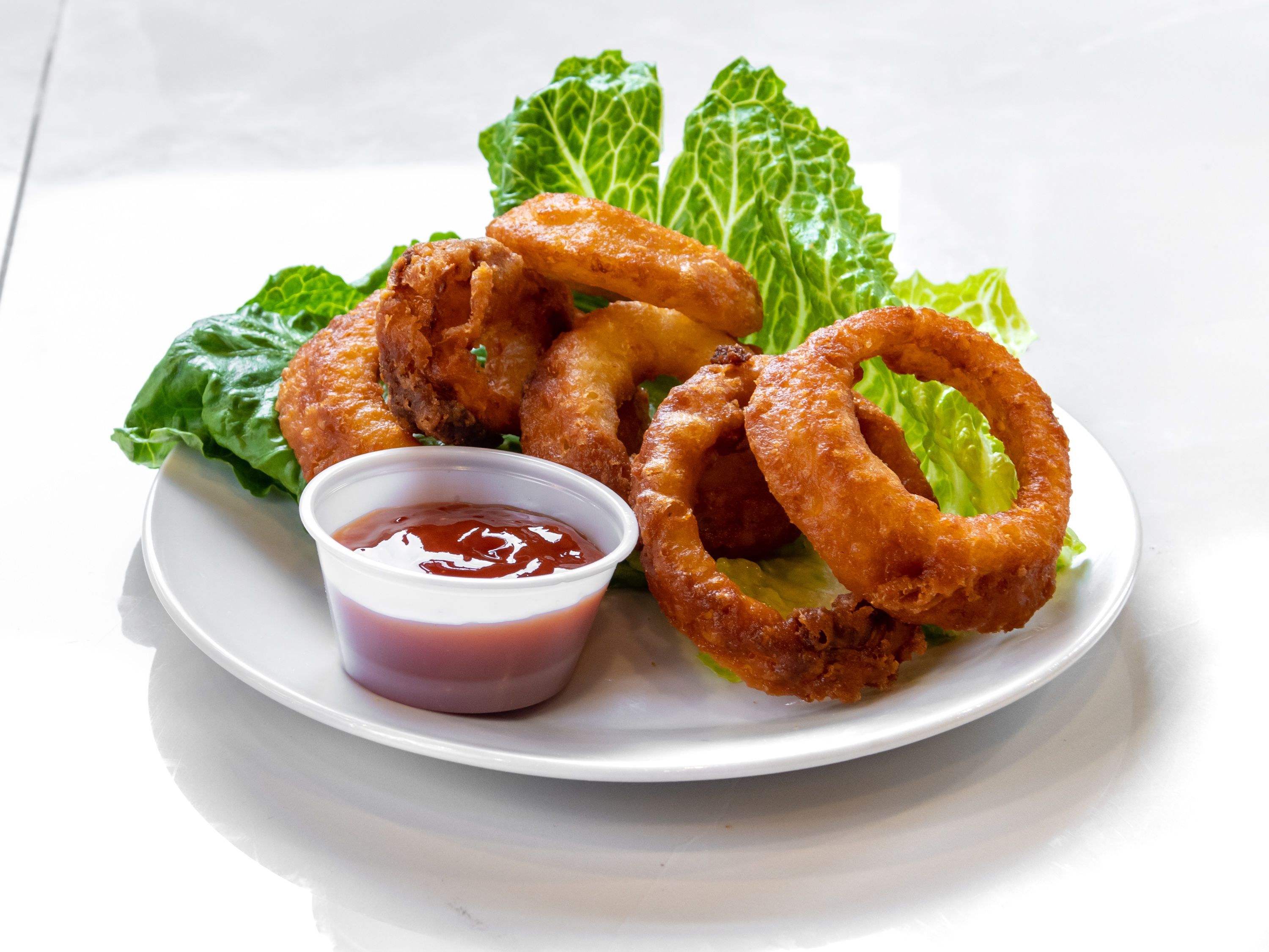 Order Onion Rings food online from New Yorker Pizza store, Leesburg on bringmethat.com